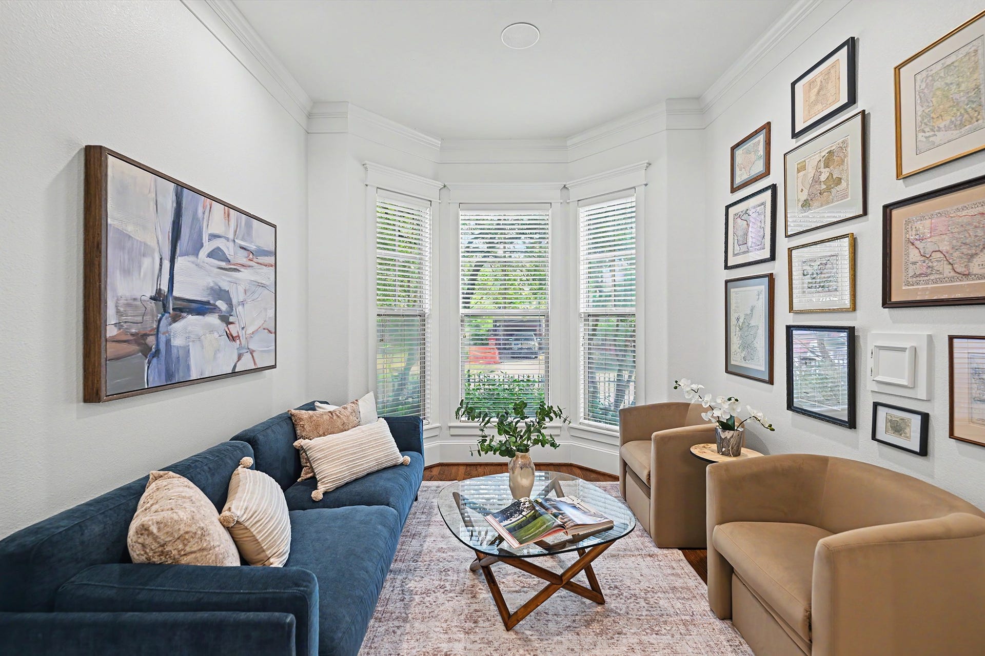Front living room is a peaceful location to enjoy quite conversation while enjoying the view out to the front yard.