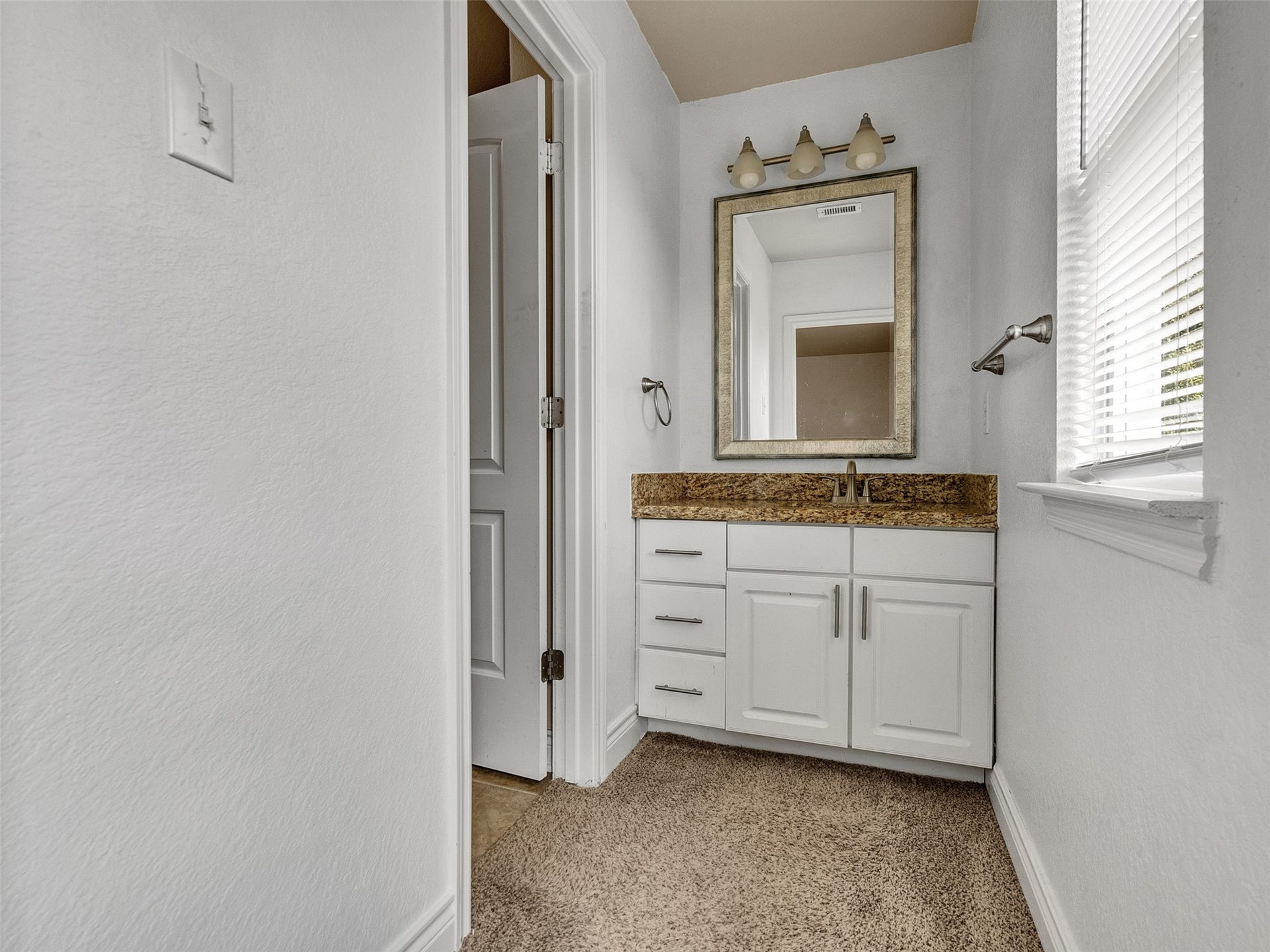 14102 April Glen Court, Cypress, TX 77429 Jack and jill bath between two rooms each room has its own sink/vanity area