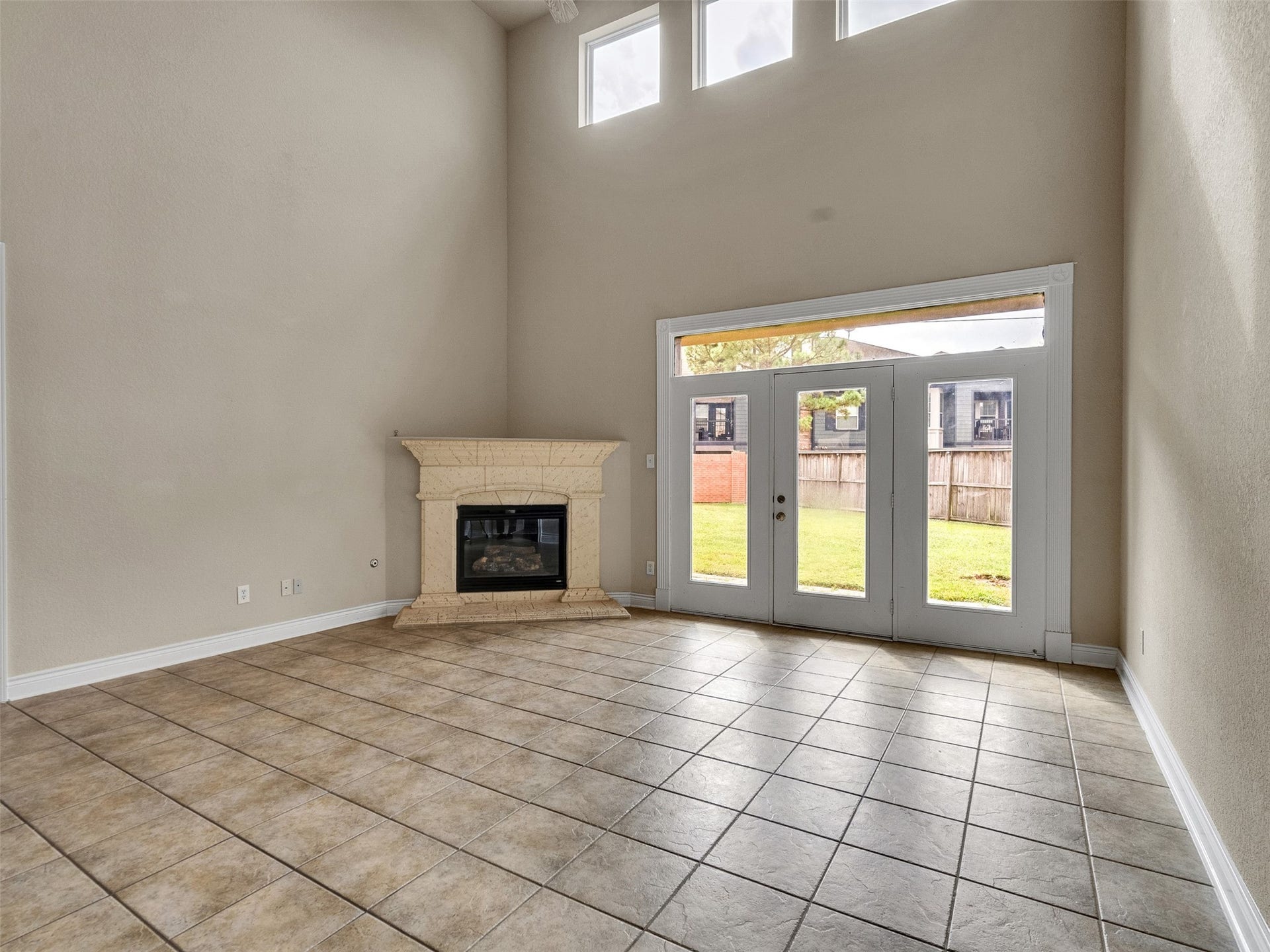 14102 April Glen Court, Cypress, TX 77429 Huge living room with high ceilings and wall of windows leading to your huge back yard