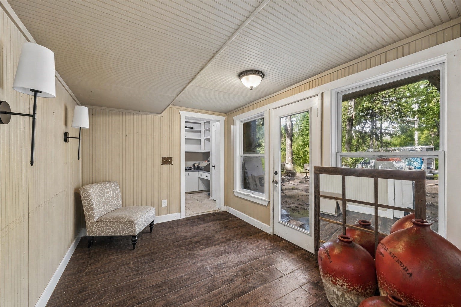 226 S Pine Drive, Montgomery, TX 77356 A glass door opens toward the grounds, creating a pleasant spot to pause with morning coffee.