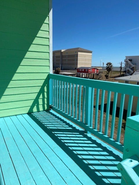 3601 Princeton, Galveston, TX 77554 Private deck for duplex unit 2 with seawall view.