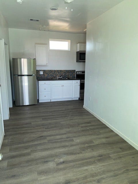 3601 Princeton, Galveston, TX 77554 Open living-dining concept in duplex unit 2.
