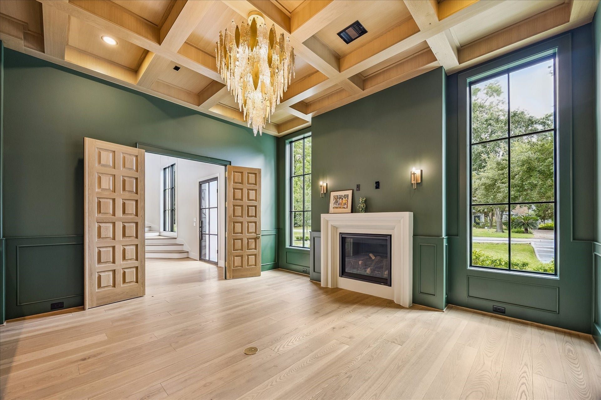 830 Azalea Street, Houston, TX 77018 This property features custom built-ins that offer perfect solutions for organizing and showcasing your favorite items. The white oak double doors offer a grand entrance with their custom craftsmanship.