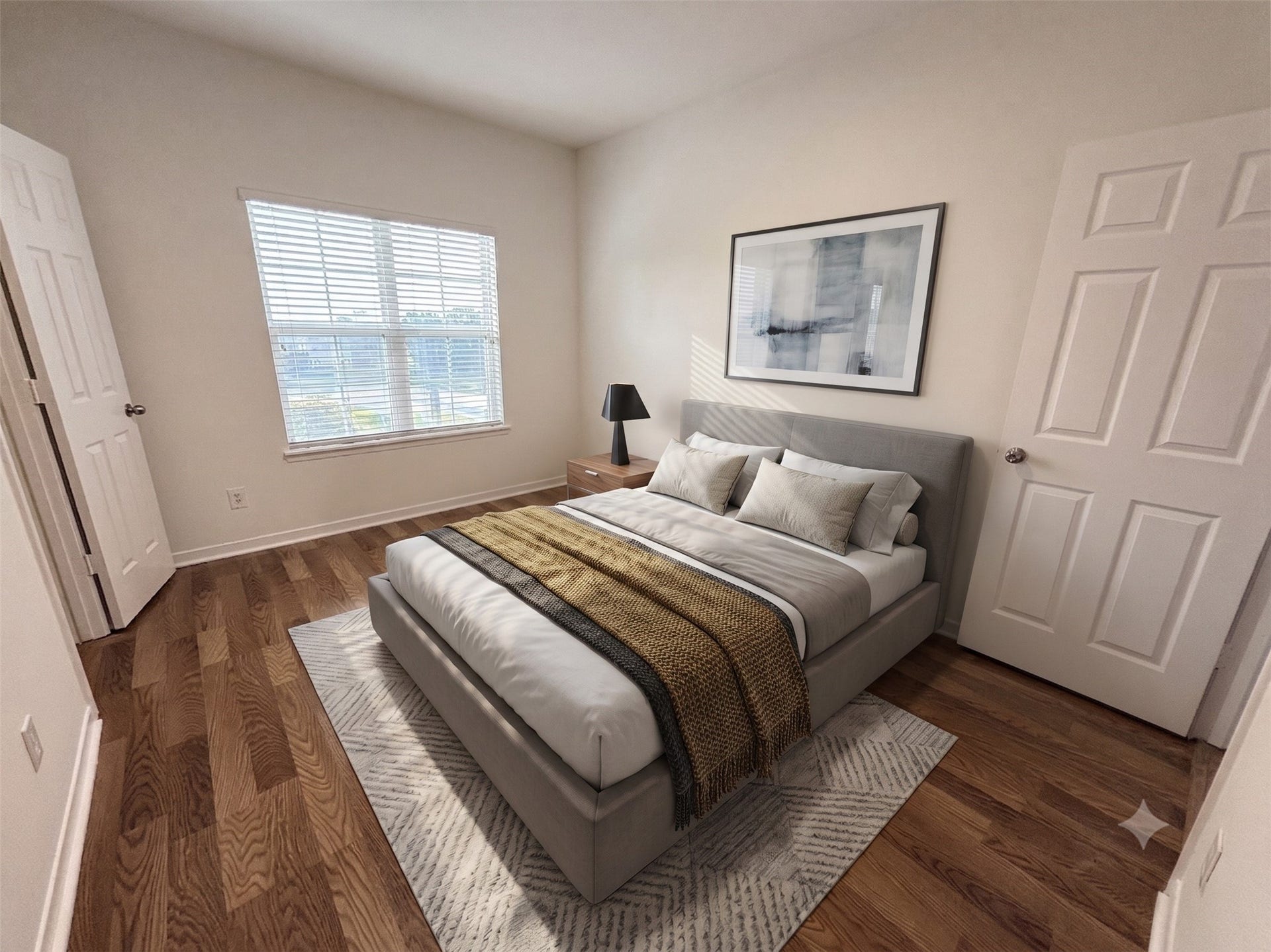 Secondary bedroom also with vinyl plank flooring.  Virtually staged