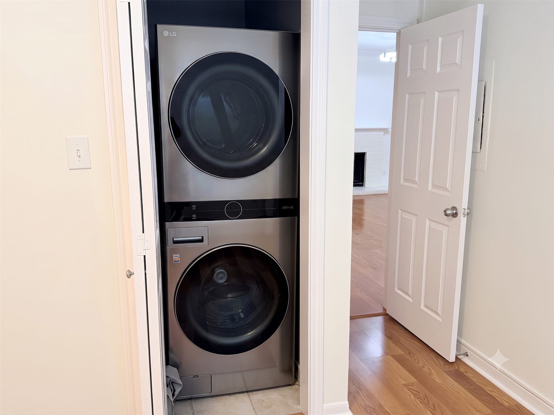 The stacked full size washer and dryer will stay with the unit.