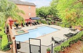Complex offers a pool, picnic area, and exercise room.