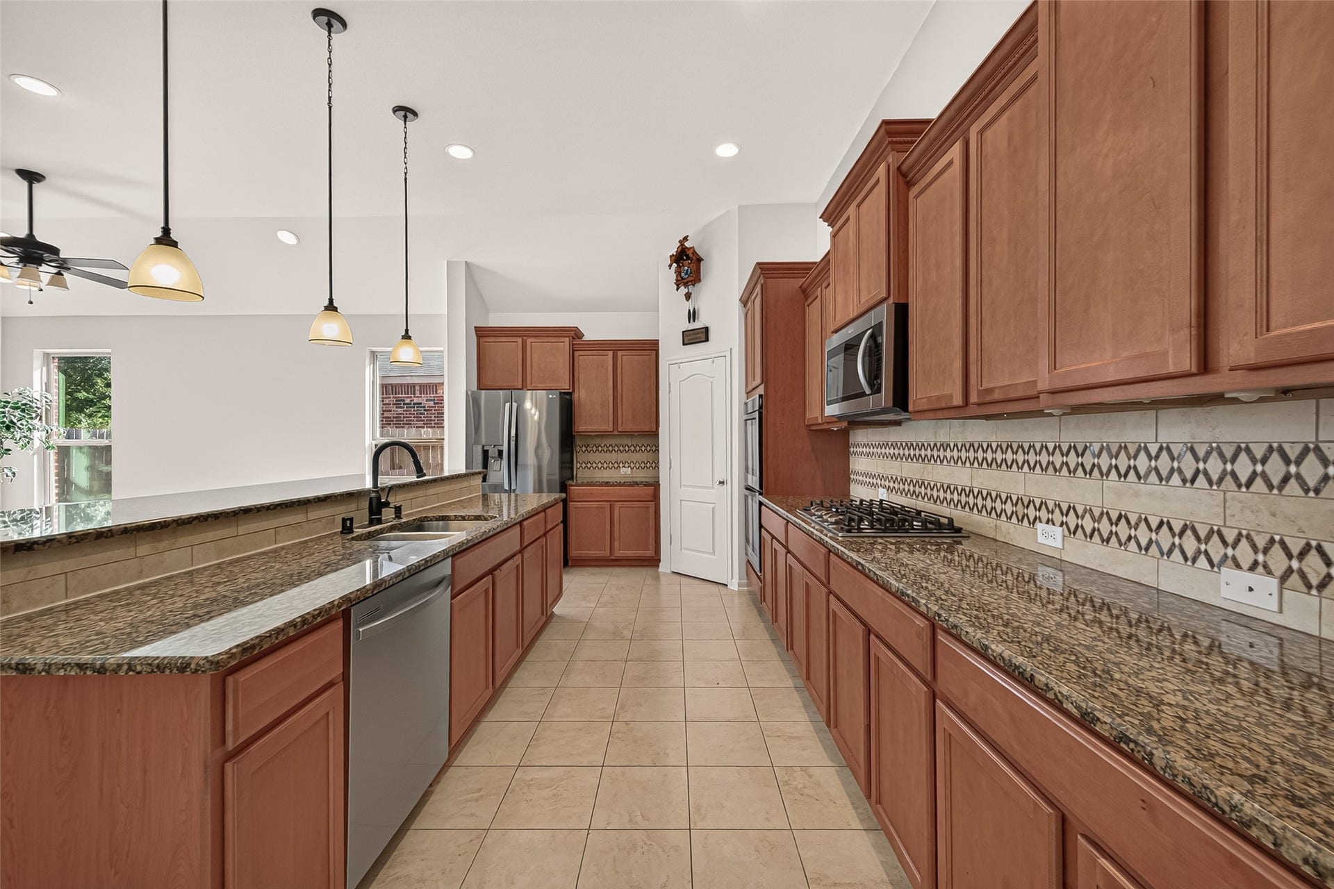 1011 Worth Creek Lane, Katy, TX 77494 Long open space kitchen with plenty of cabinets