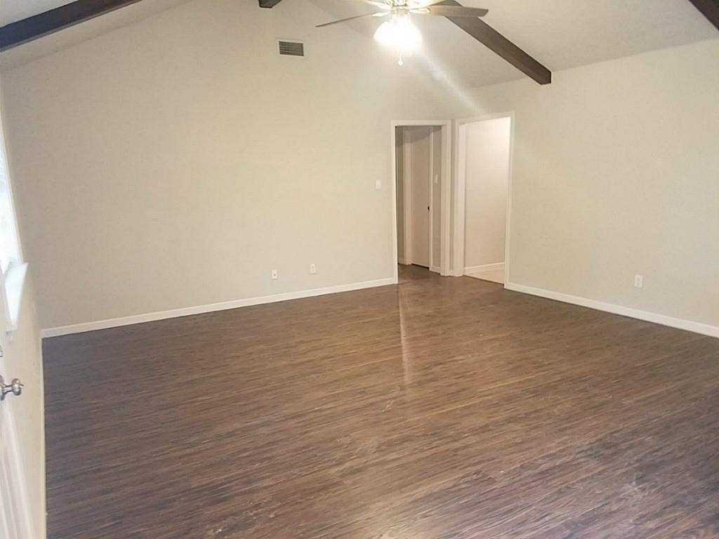 new wood floors in comfy den