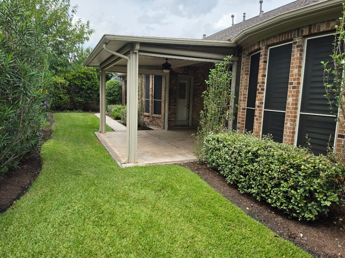 12619 Mossy Ledge Drive, Tomball, TX 77377 View of backyard with privacy screens up
