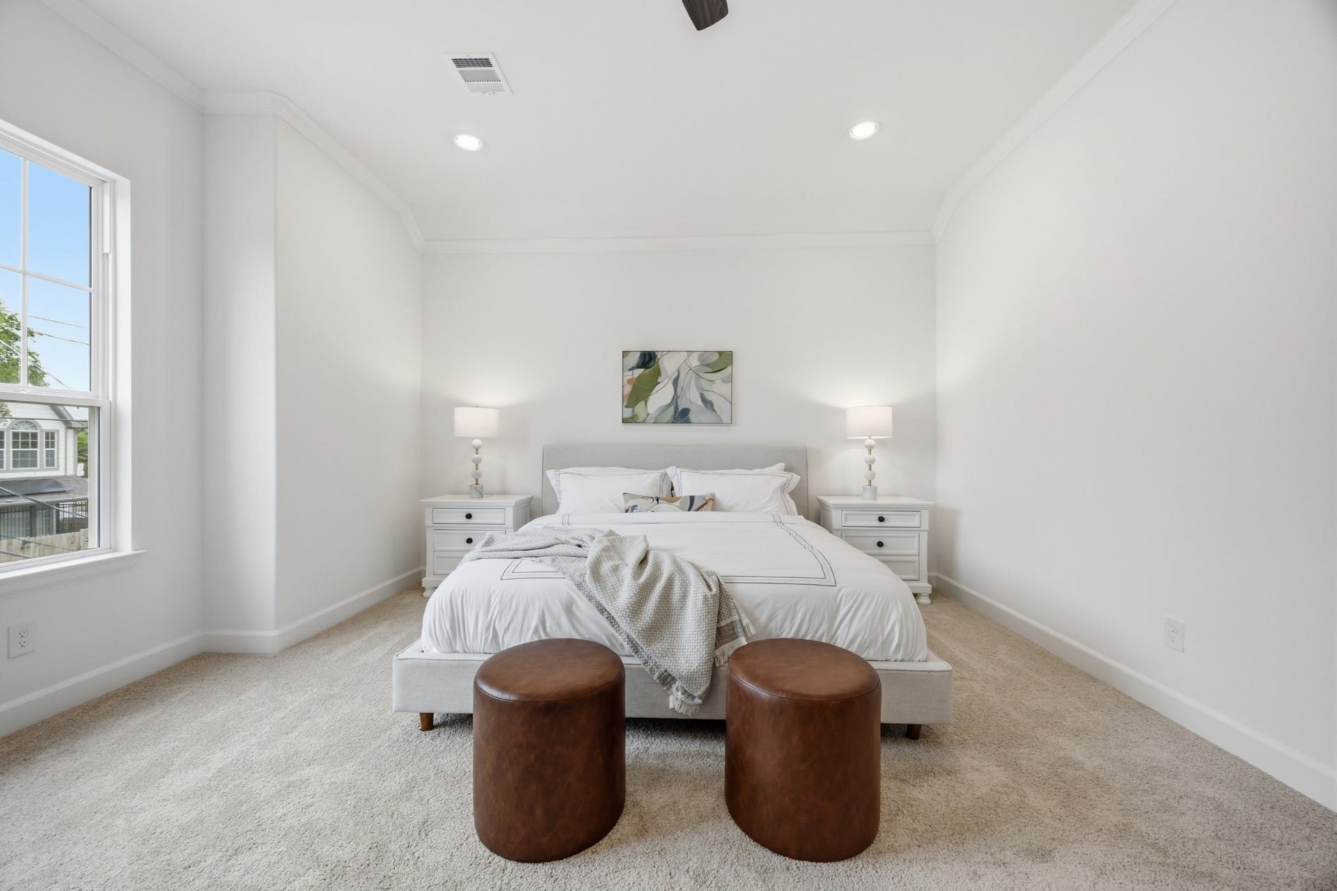 5405 Nolda Street, Houston, TX 77007 Primary Sanctuary: Elegance meets comfort with standard crown molding, ample space for a king-sized bed, and oversized nightstands, creating the perfect retreat to unwind and recharge.