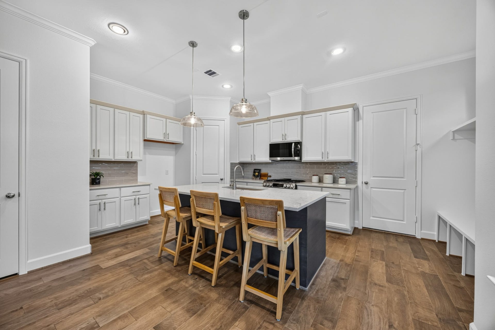 5405 Nolda Street, Houston, TX 77007 Culinary Paradise: A chef's dream kitchen awaits, featuring direct garage access for seamless transitions from car to culinary creation.