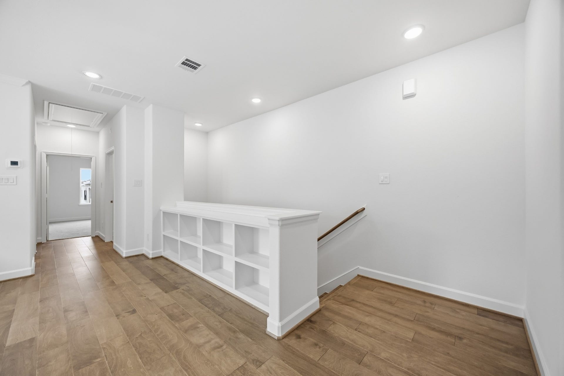 5405 Nolda Street, Houston, TX 77007 Entertainer's Nook: This game room is perfectly appointed with built-in shelves to showcase your interests and a ceiling fan above to ensure a cool, inviting atmosphere for every play.