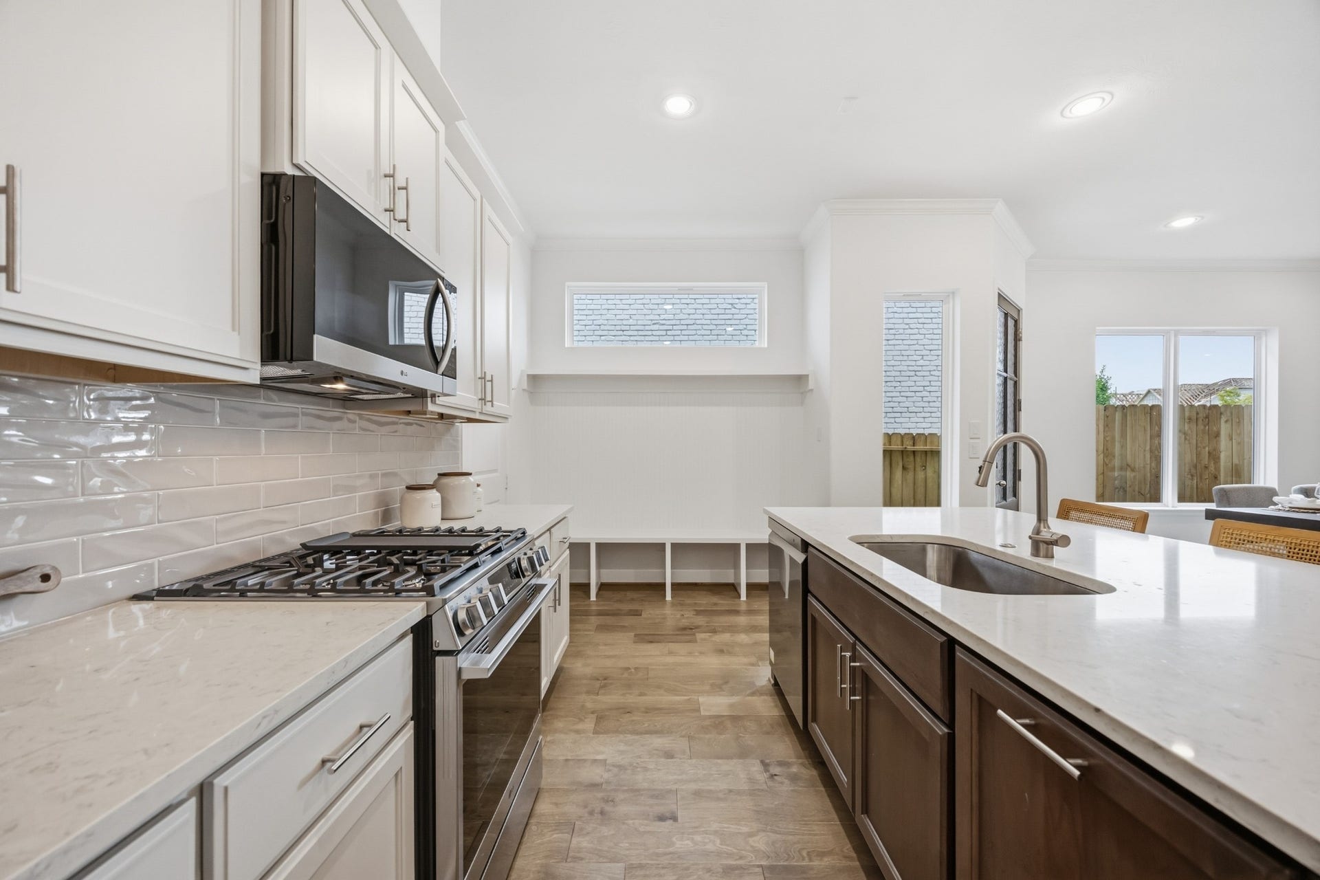 5405 Nolda Street, Houston, TX 77007 Sophistication Redefined: The kitchen's centerpiecean elegant islandawaits the glow of your chosen pendant light upgrade, making every moment in the heart of the home shine brighter.