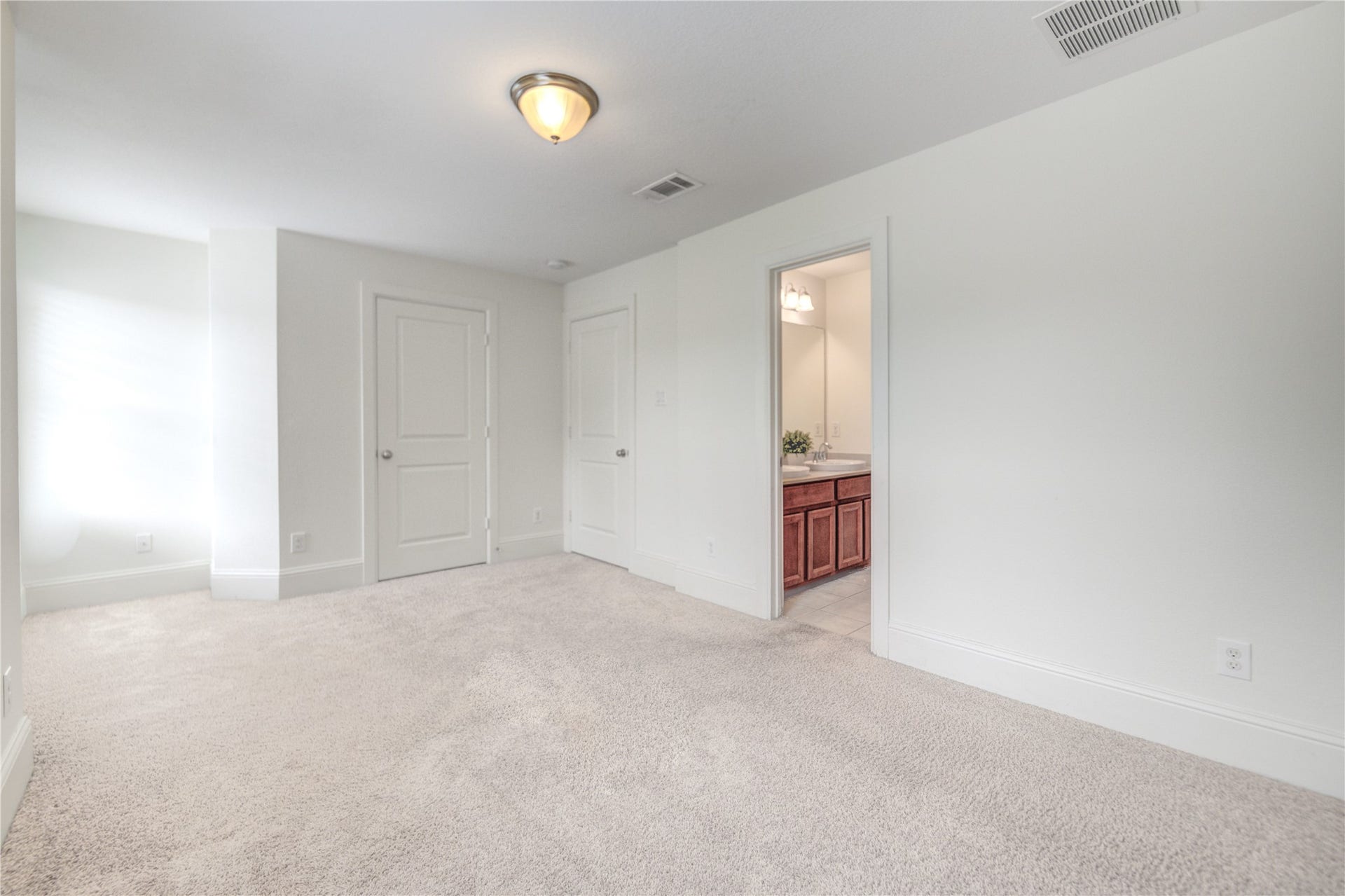 Third bedroom upstairs has its own full bathroom.