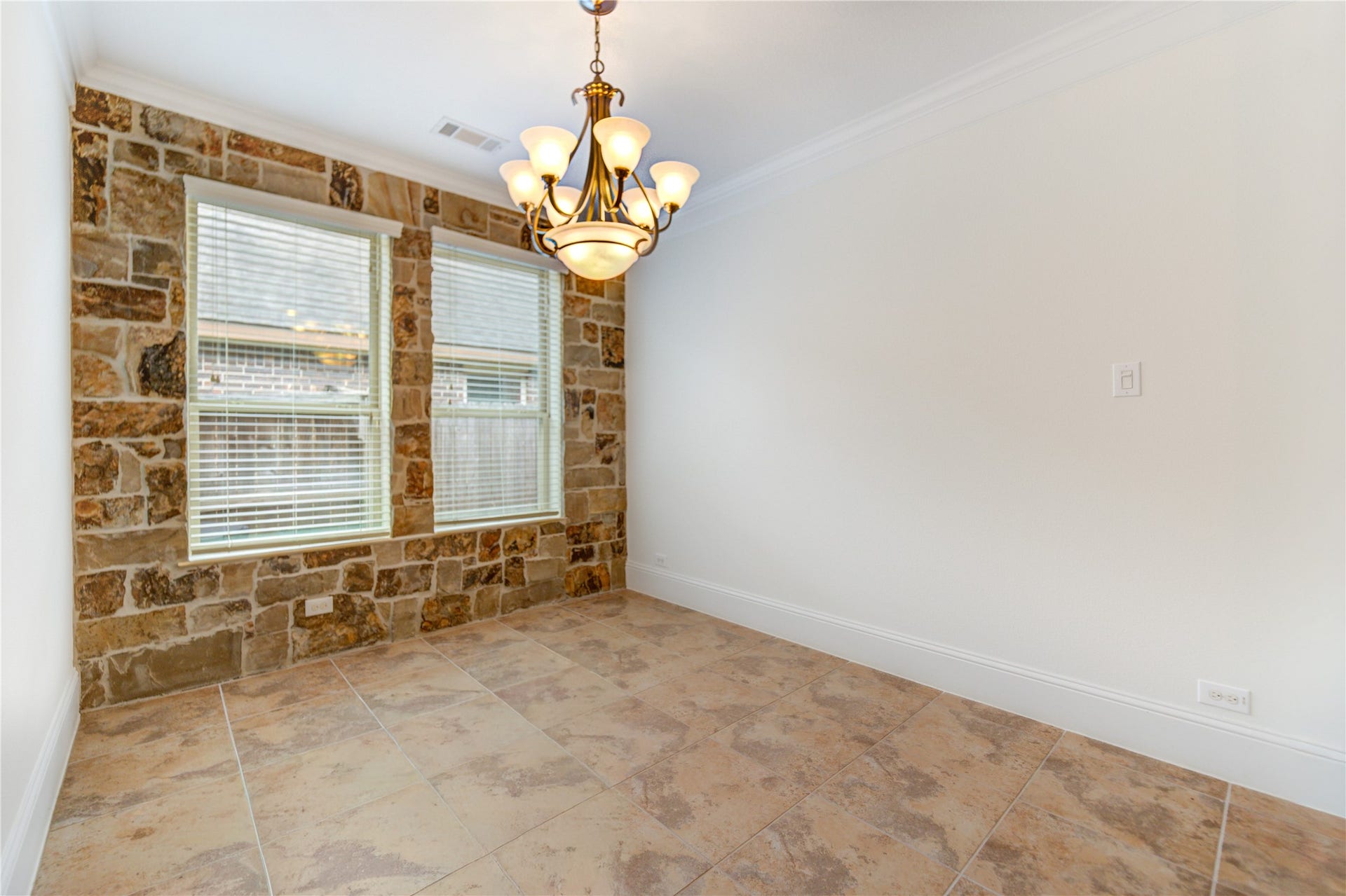 Beautiful, customized slate enhances the dining room area.