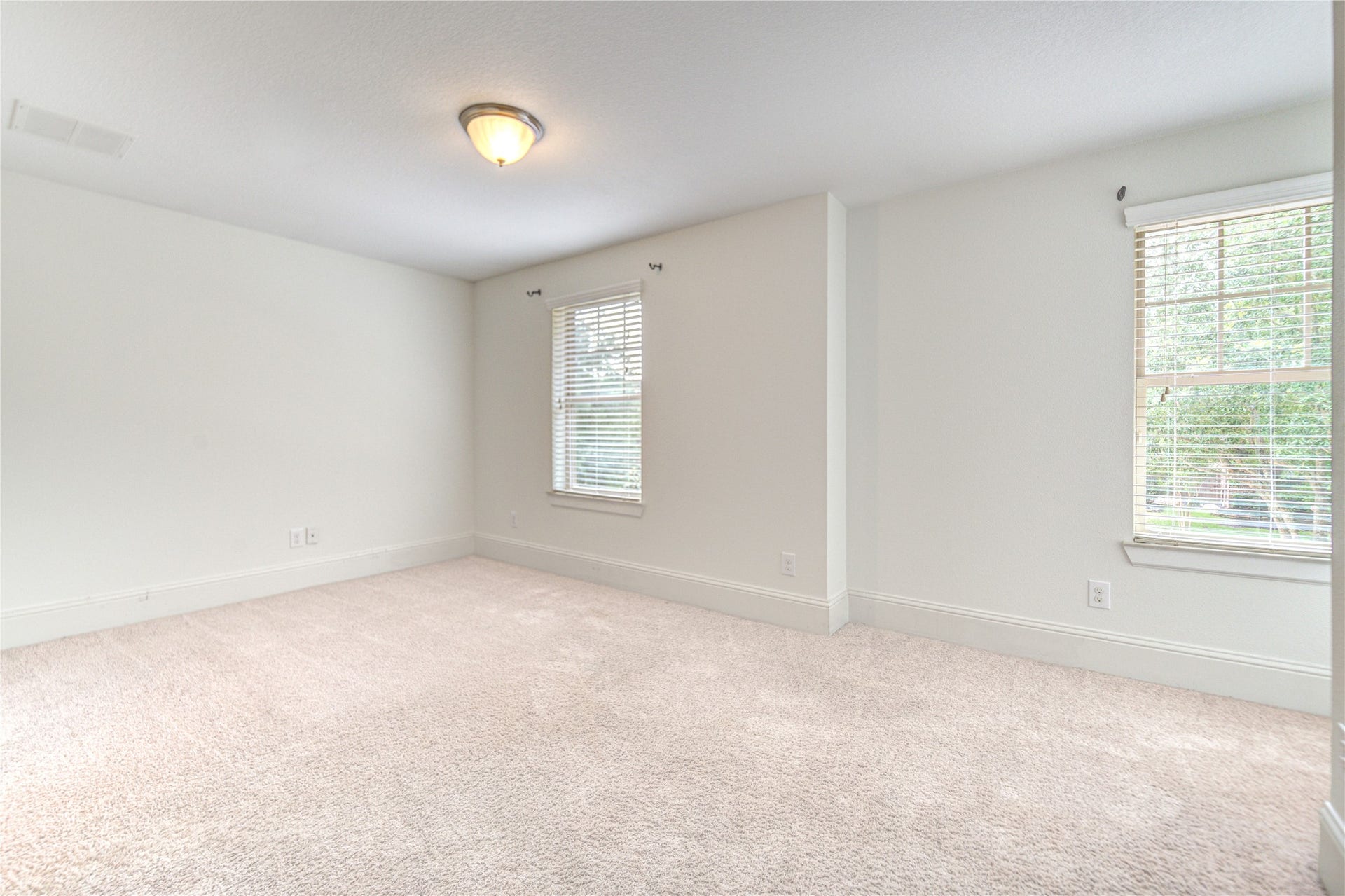 This is another view of the second bedroom upstairs. It is huge!
