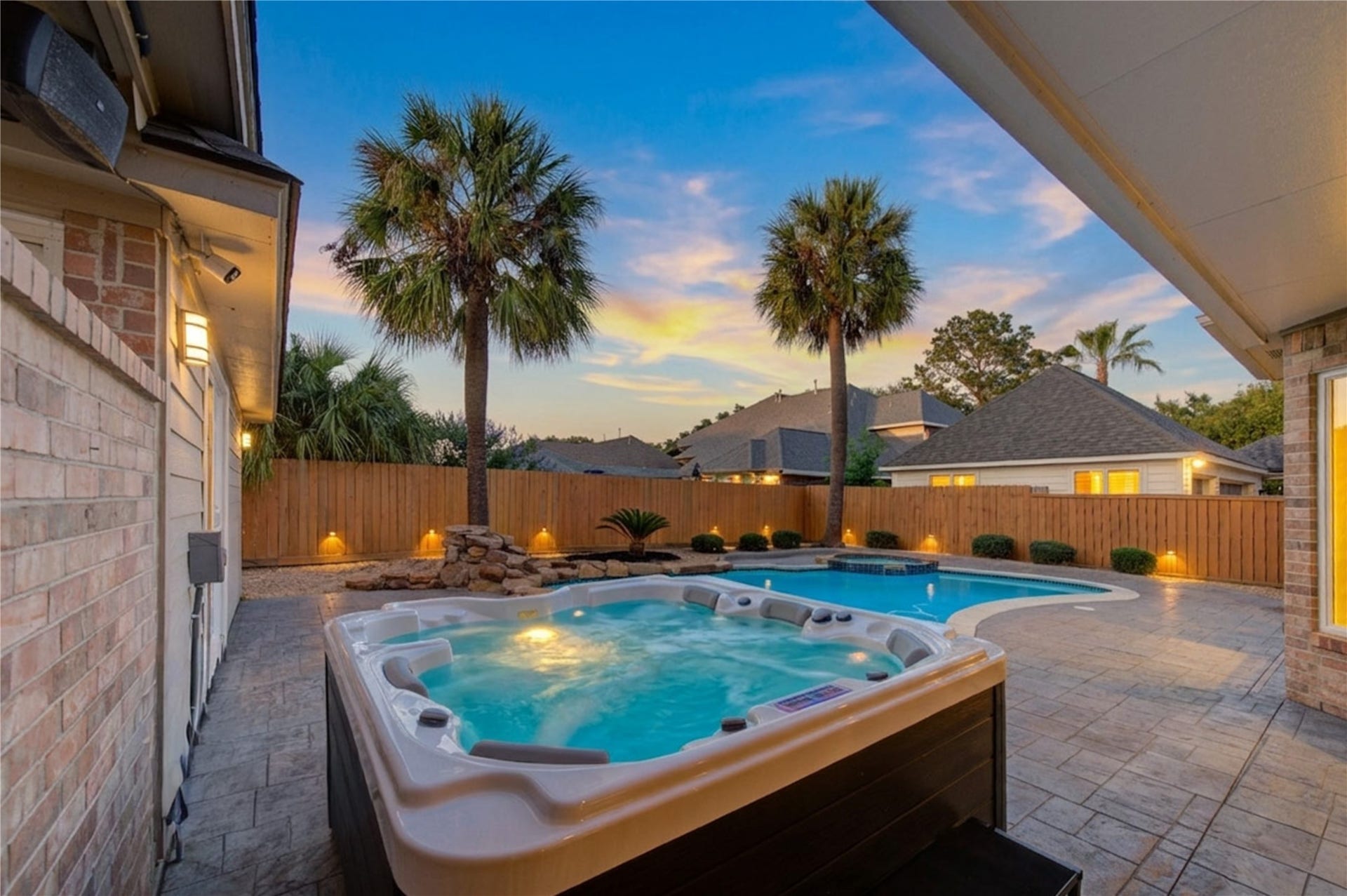 12806 Rock Falls Way, Houston, TX 77041 Escape to your personal paradise with a stunning pool and spa, offering resort-style relaxation daily.