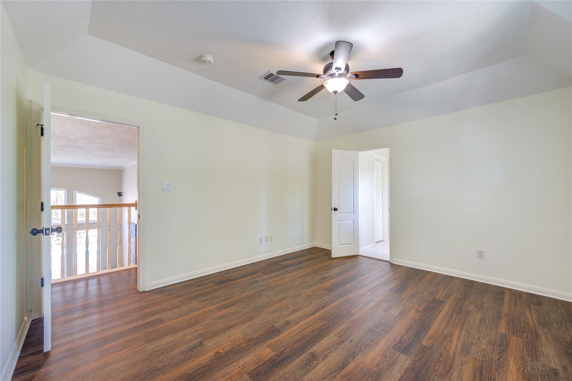 12806 Rock Falls Way, Houston, TX 77041 Spacious and bright secondary bedroom with a ceiling fan.