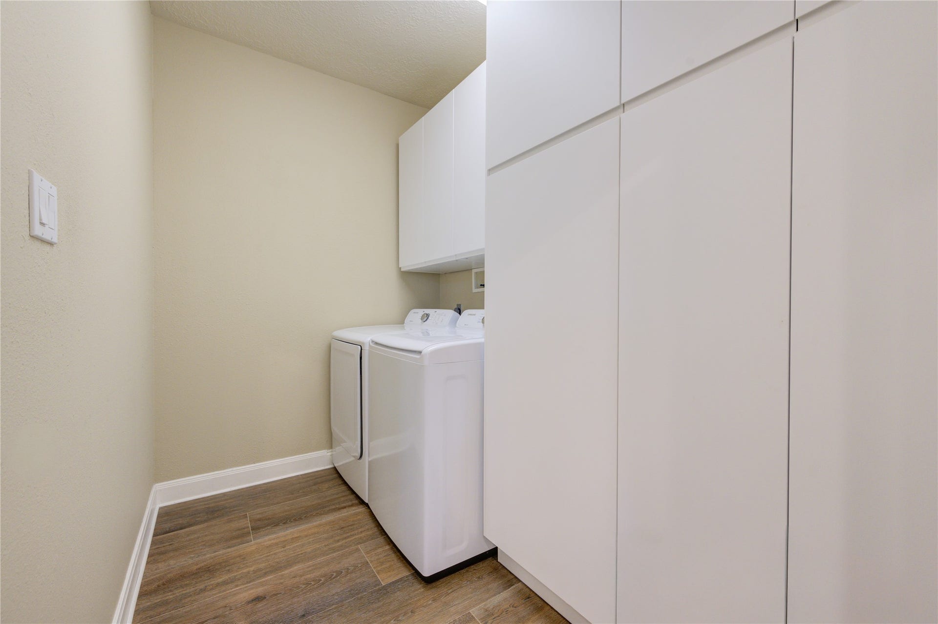 12806 Rock Falls Way, Houston, TX 77041 Large walk in laundry room with built in cabinets.
