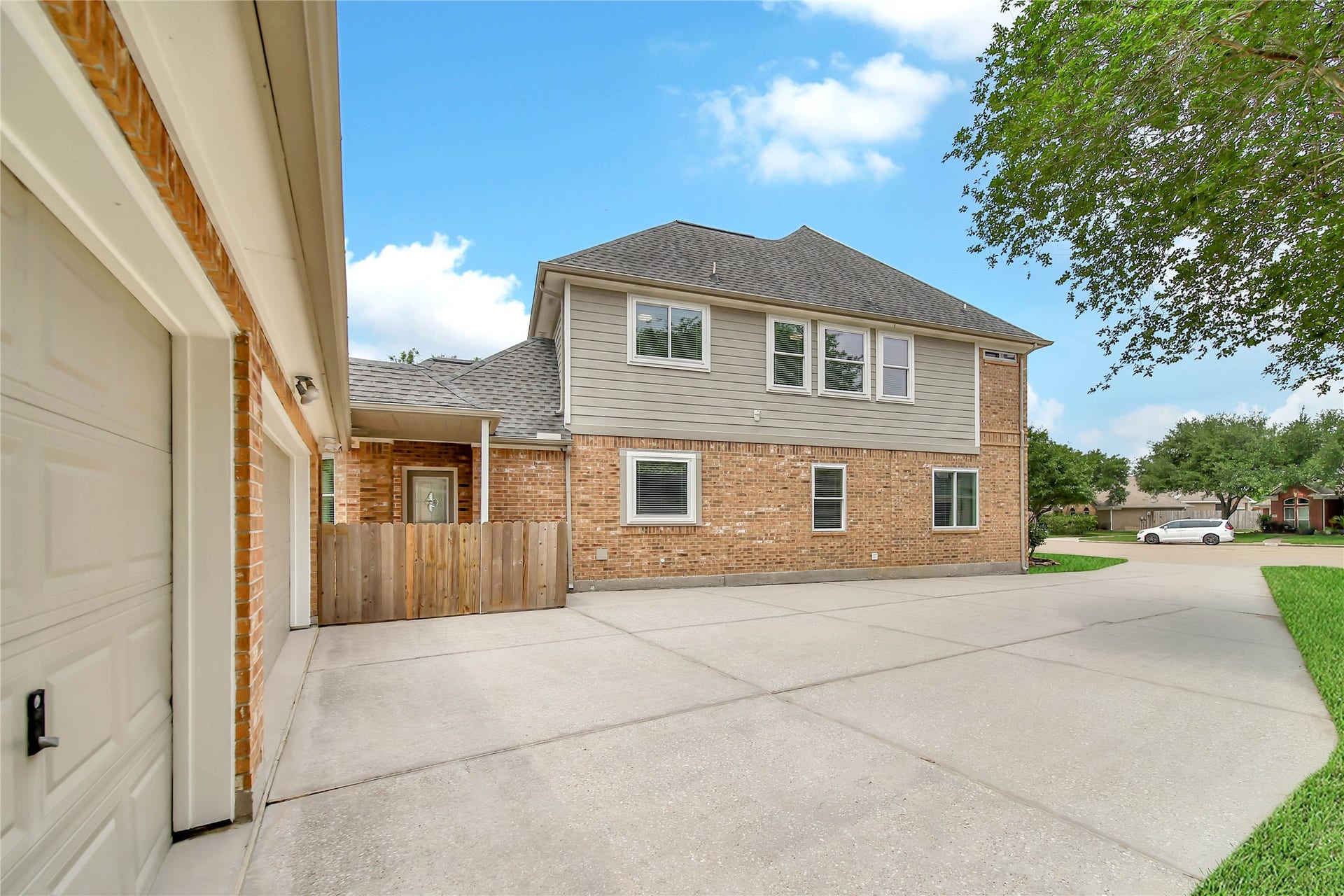 This driveway is a workhorse, servicing the 3 Car Garage and offering additional parking space if needed.