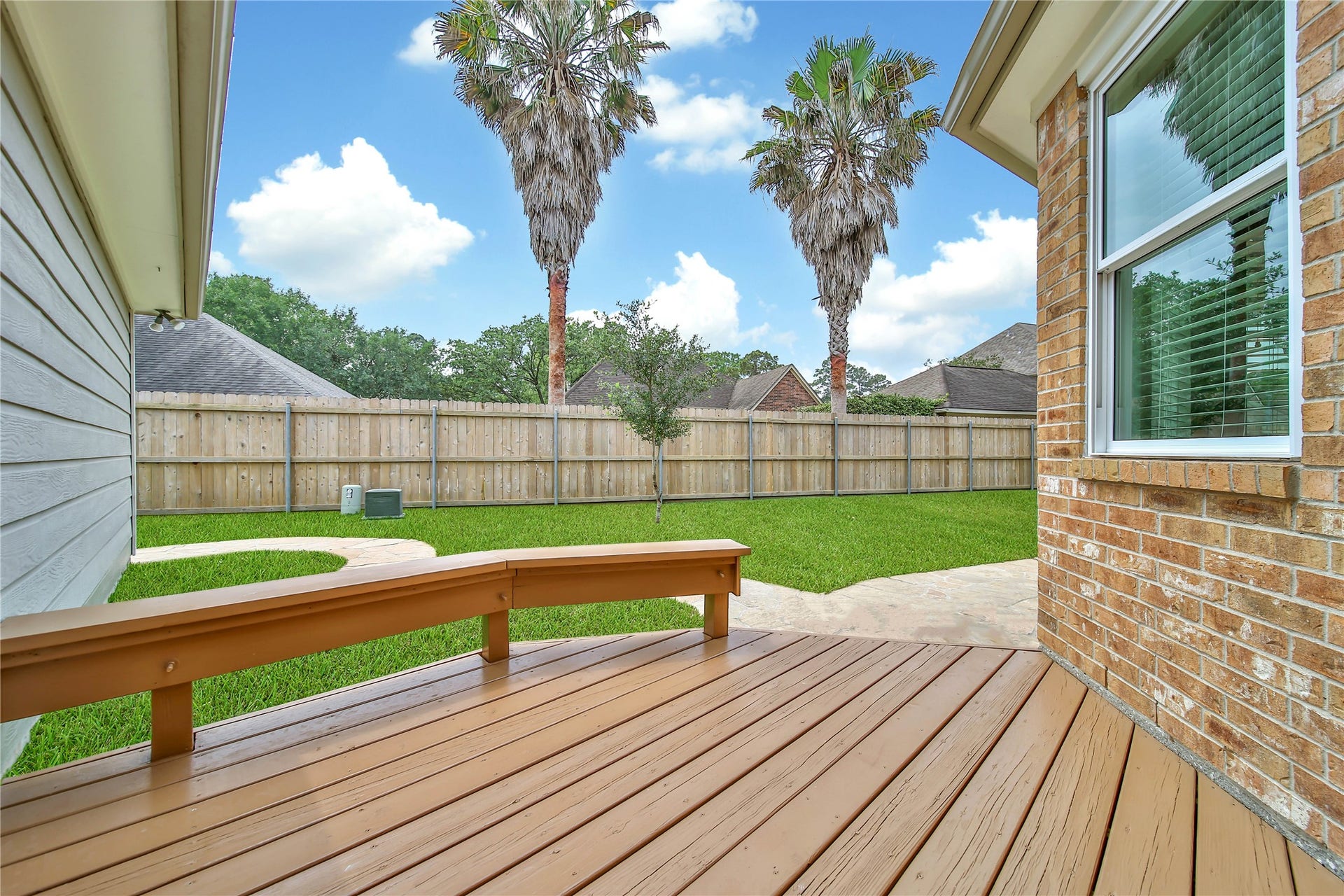 Enjoy this deck that flows out from Kitchen breakfast nook onto the patio in the backyard.