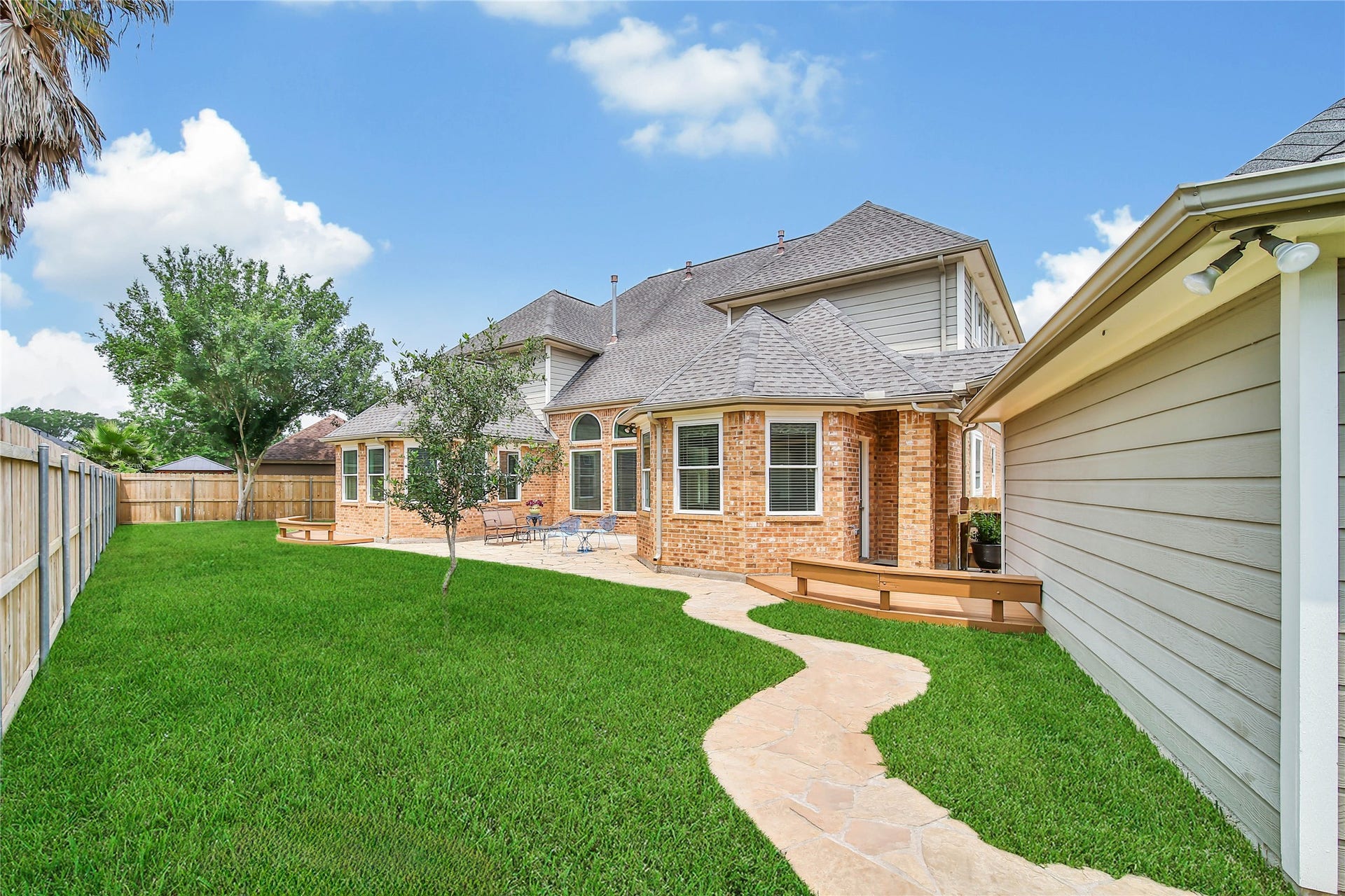 This backyard has beautiful flow for your peaceful outdoor living. Meticulously maintained exterior! Come and See!