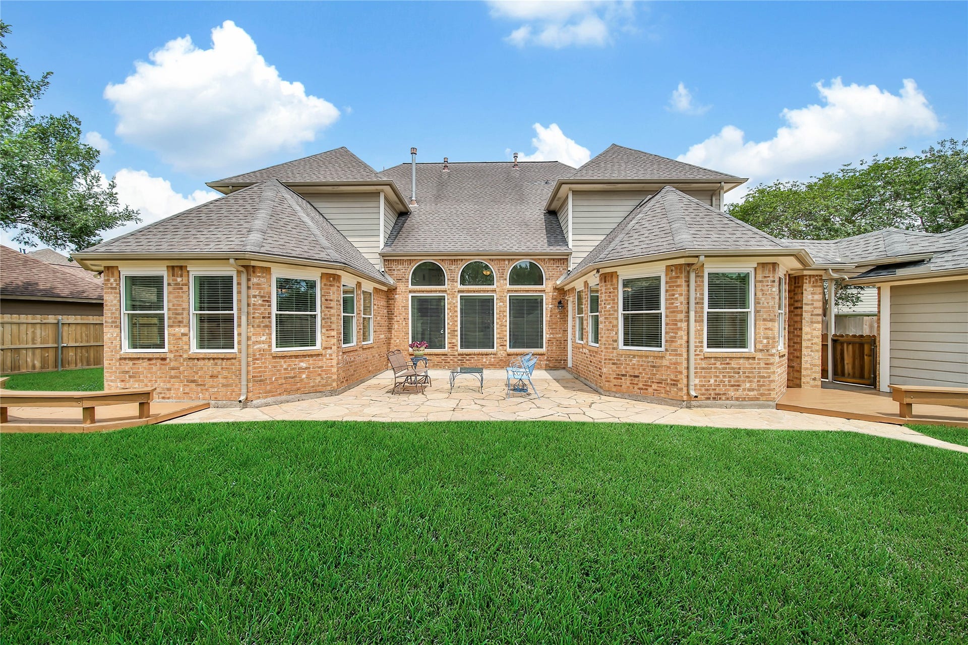 This beautiful and peaceful backyard extends to 2 large side yards that wrap around from the backyard. So fresh and well maintained!