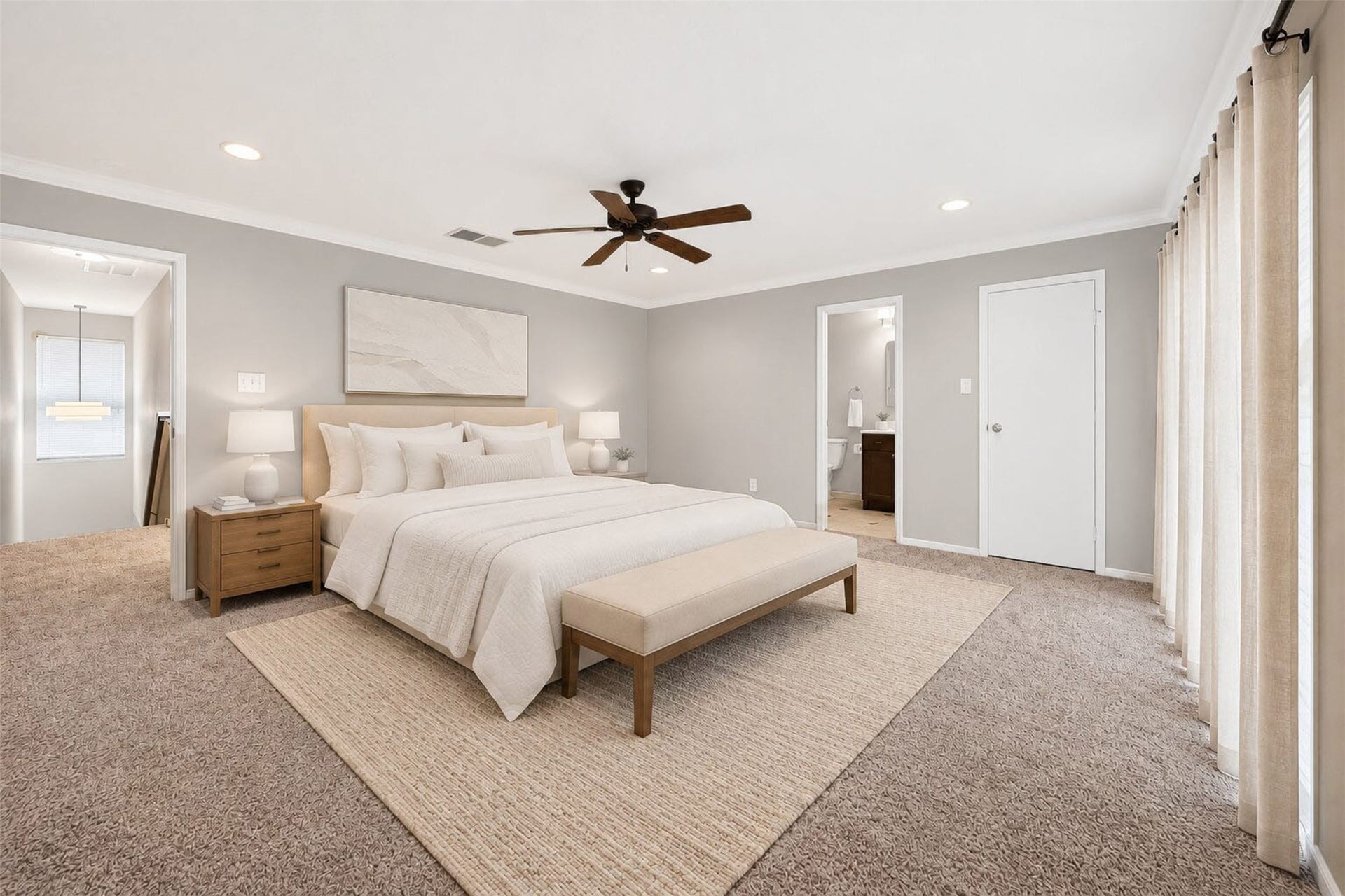 2379 Briarwest Boulevard, #85, Houston, TX 77077 Virtually staged with a dressed bed, bench, and nightstands, this spacious second bedroom includes direct access to its own bathroom ideal for guests or a roommate setup.