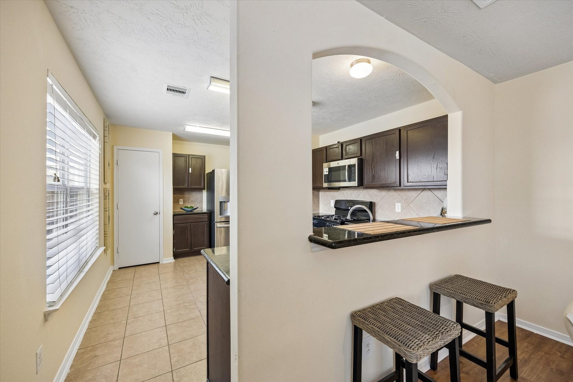 2130 Summit Meadow Drive, Houston, TX 77489 Cozy Breakfast nook with a convenient counter for casual dining and morning coffee