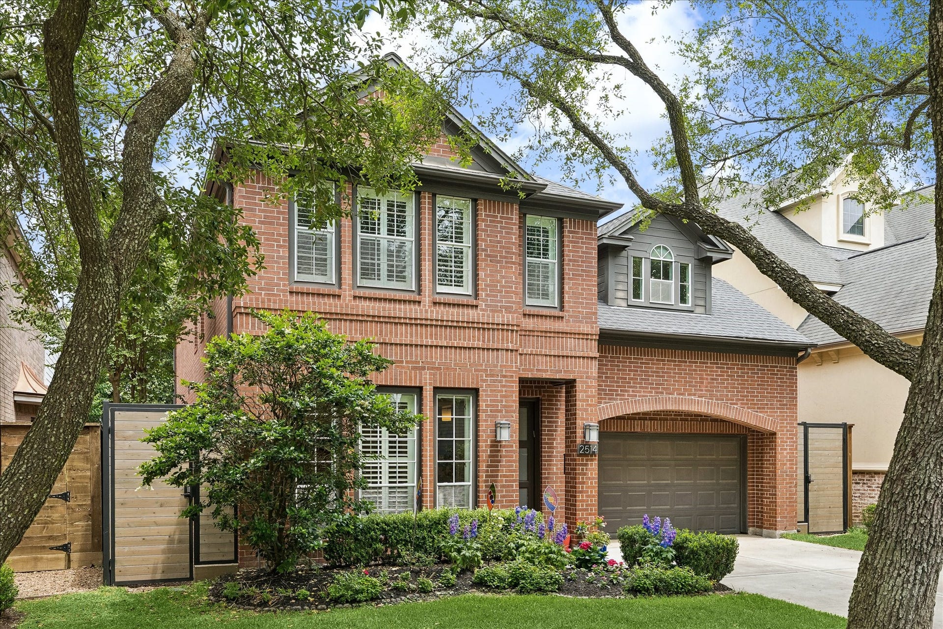 2514 McClendon has amazing curb appeal with mature trees and landscaping.