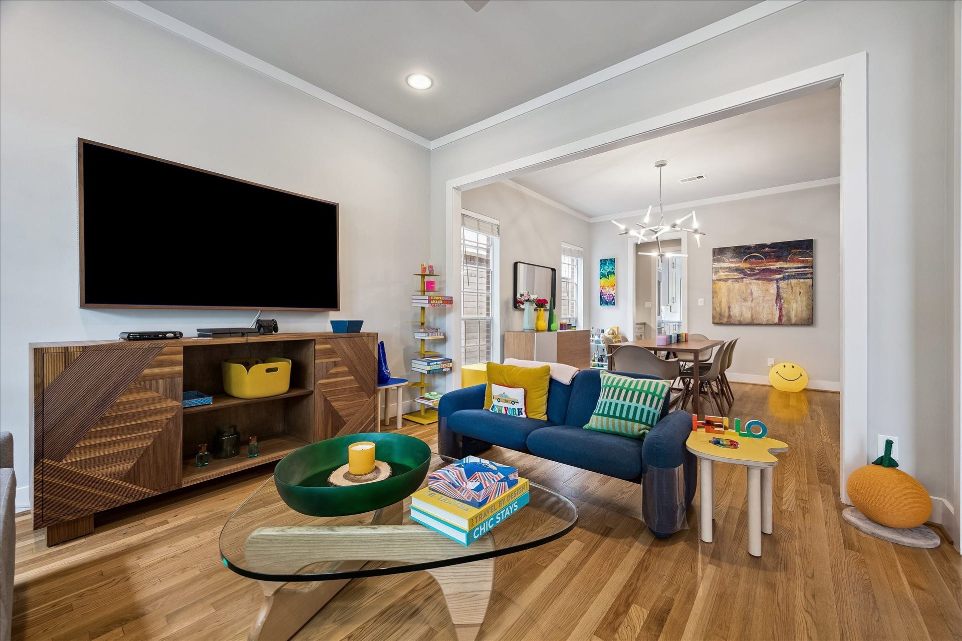 As you enter the home, to the left of the entry hall is this 13' x 12' den which is currently utilized as a seating area.  One could easily transform this room into a home office simply by enclosing the cased opening with doors to create a layer of privacy.