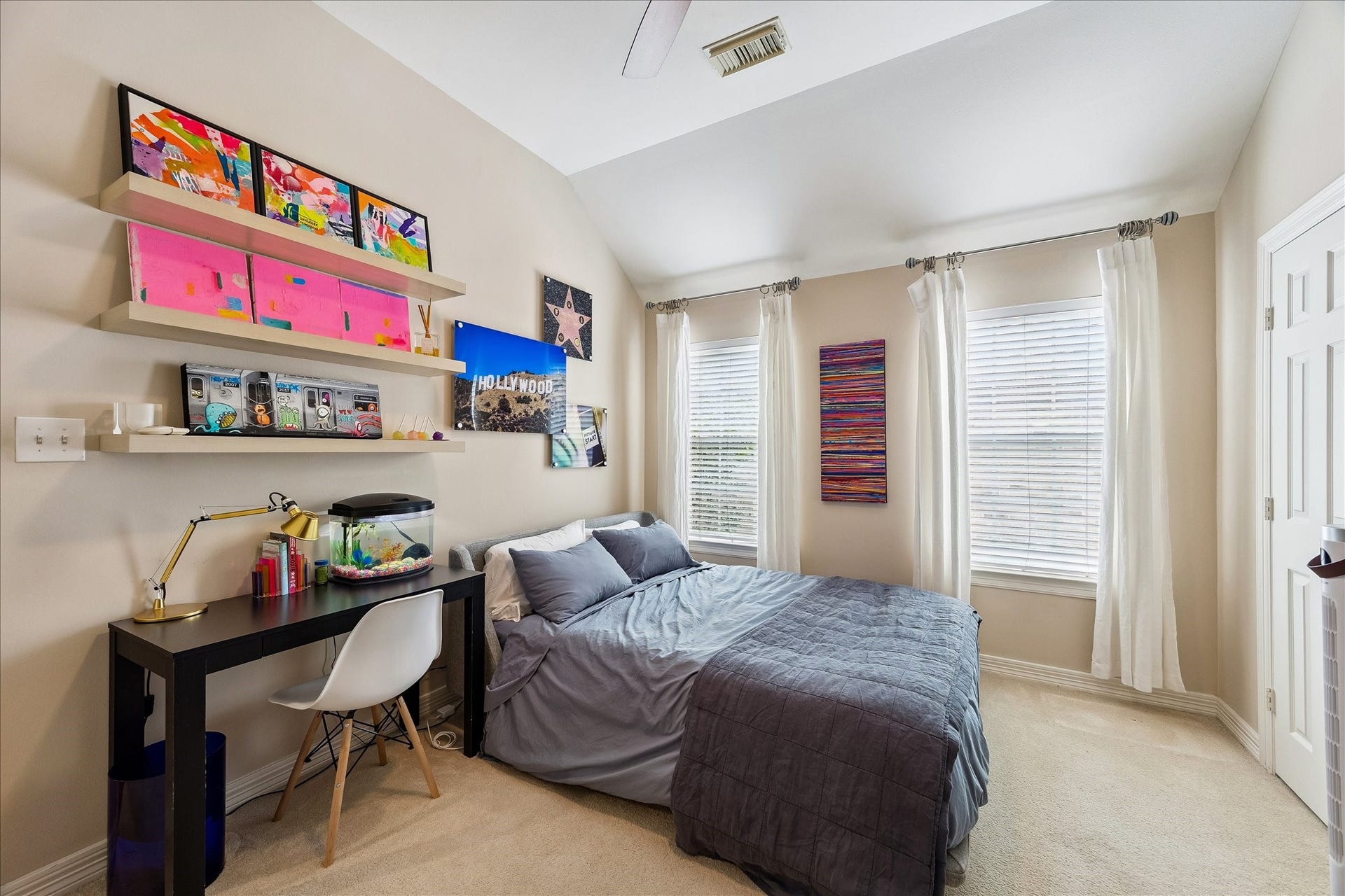 The bedroom along the west side of the home also has a large walk-in closet.