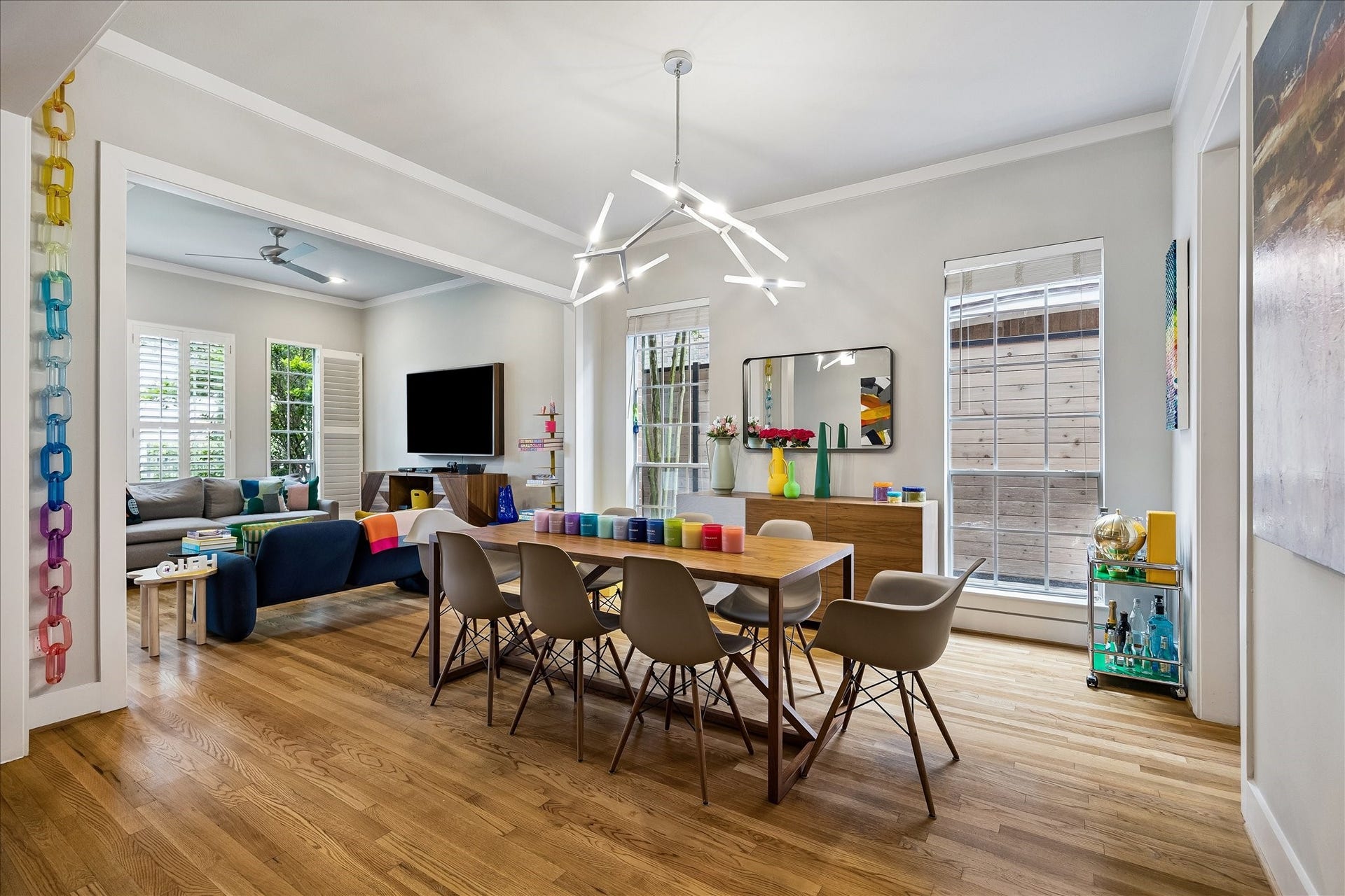 Oversized west facing windows and high ceilings create a voluminous impact for this room.
