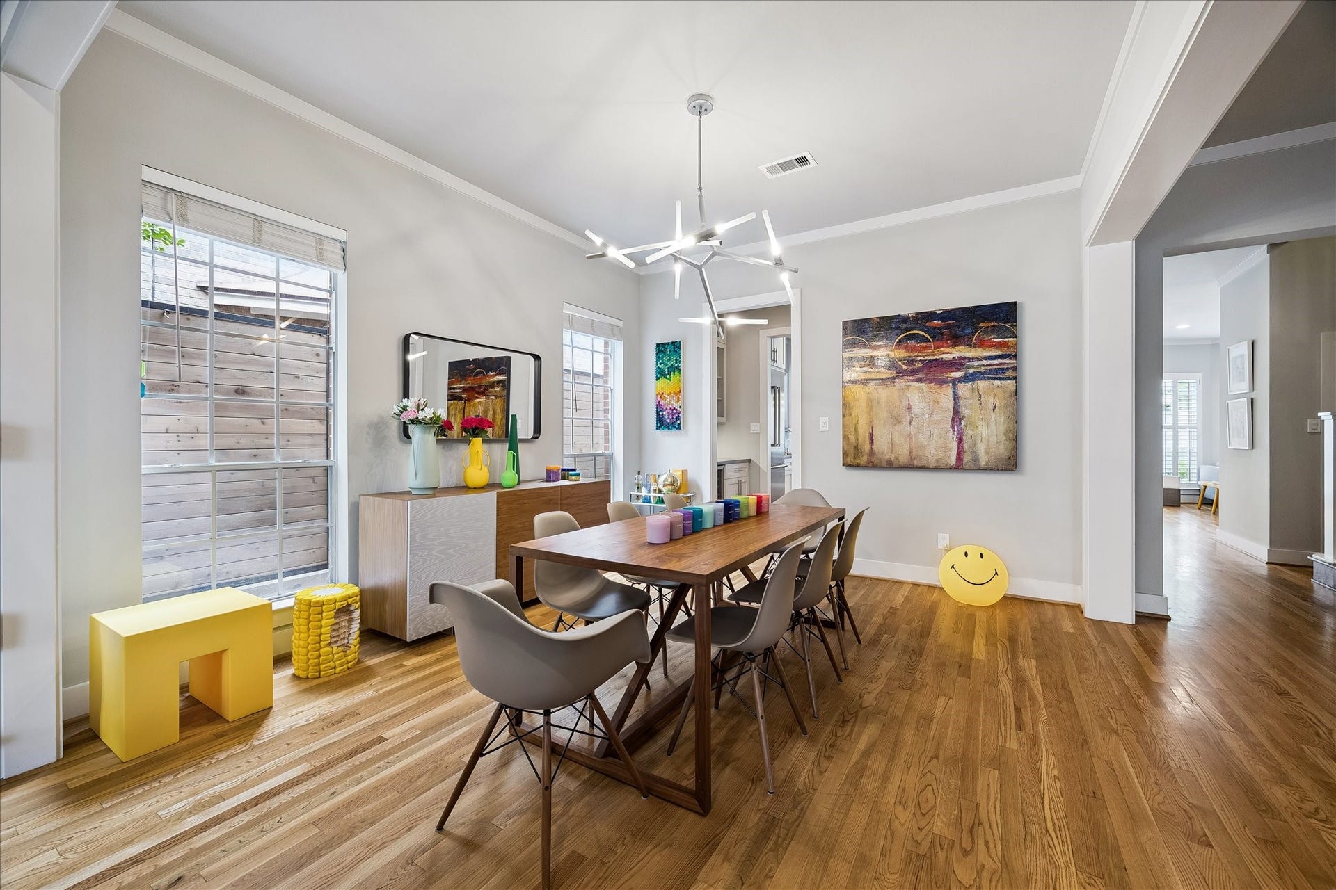 Just on the other side of the dining table is a cased opening that leads to the butler's pantry.  The hallway to the right takes you to the main living room.