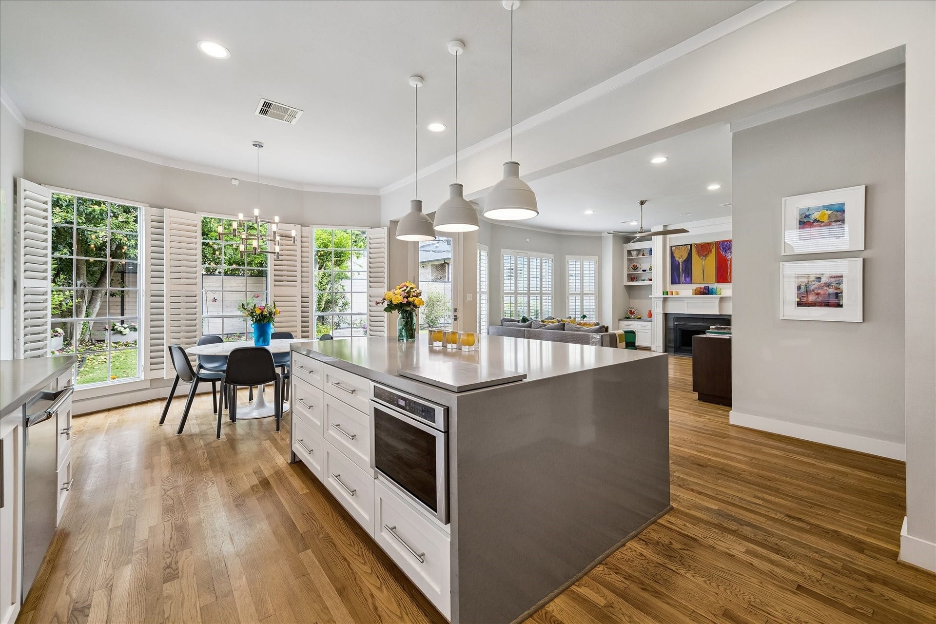 Here is a view of the kitchen, breakfast and family room where you will find the undercounter microwave drawer at the island.