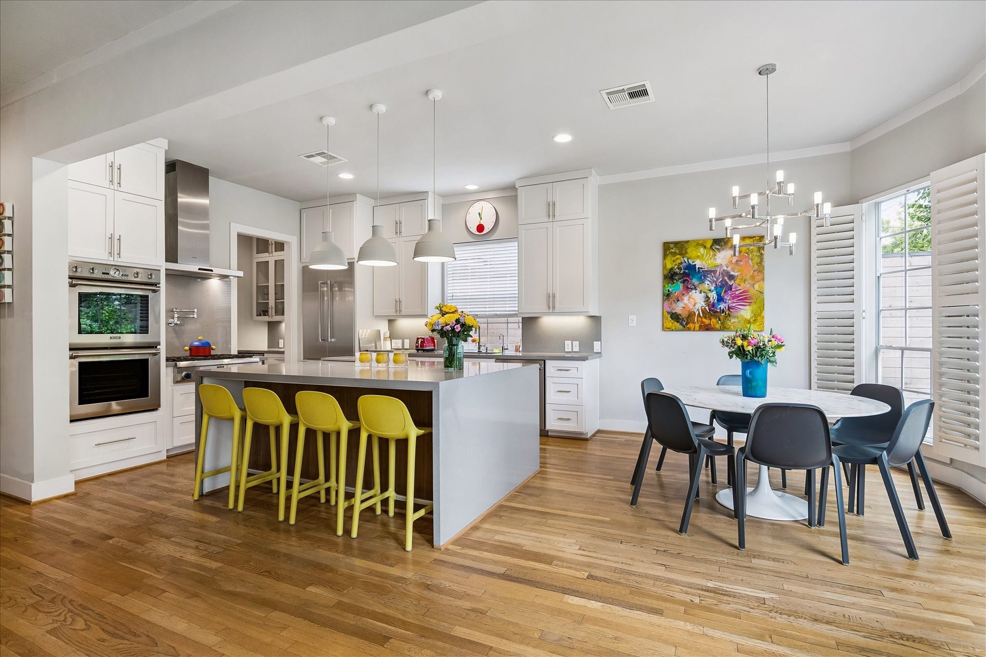 Stepping back into the home from the backyard and walking into this cheerful space makes one feel happy.