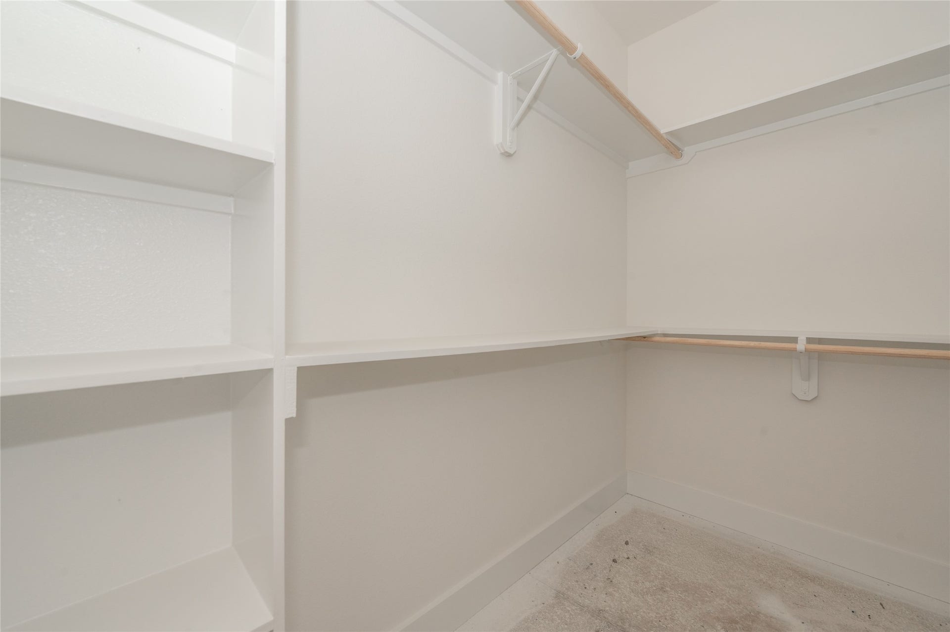 Primary bedroom walk-in closet