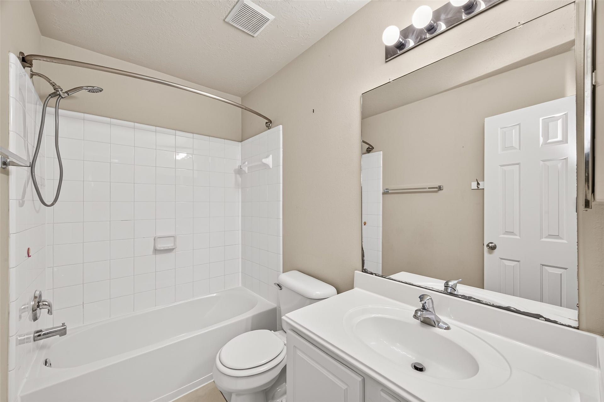 8734 Thistlemoor Lane, Houston, TX 77044 Bathroom with tub and shower combo