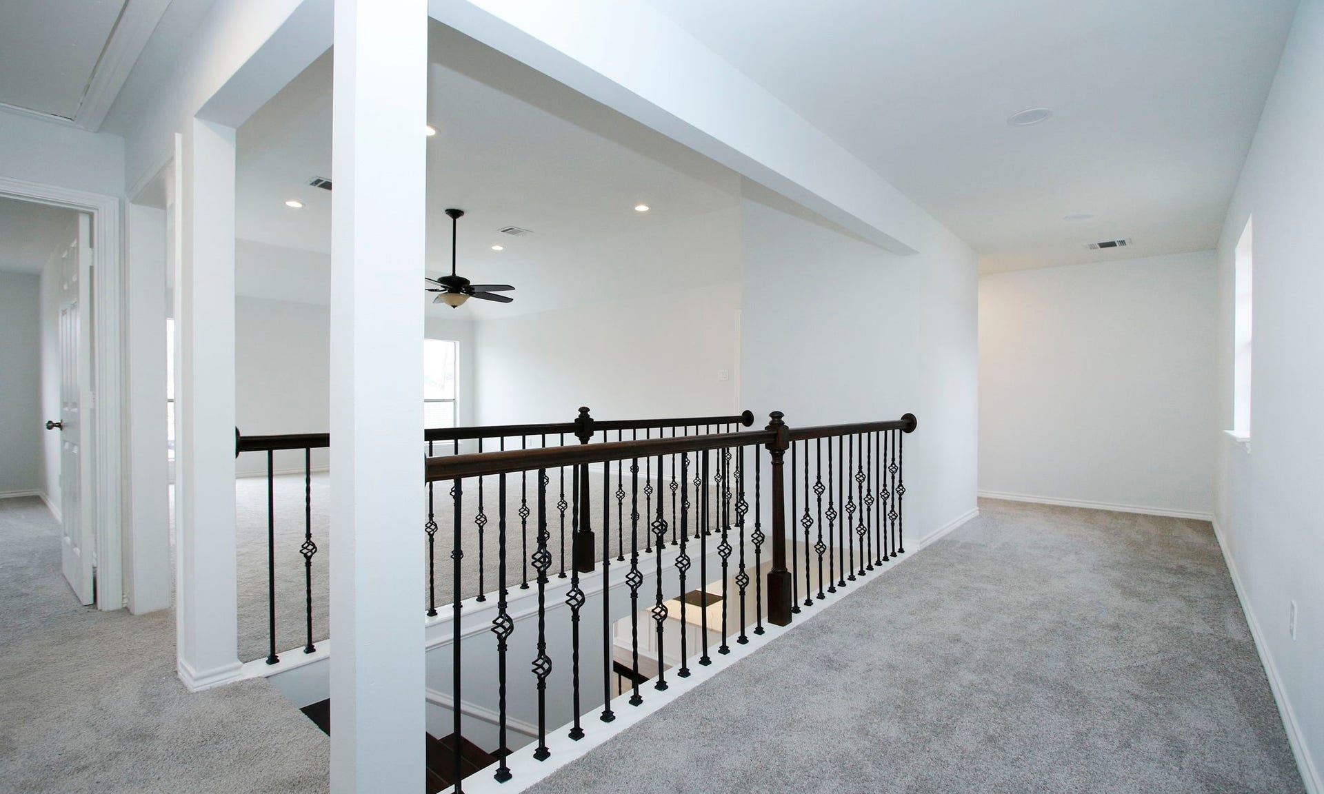 3515 Stoney Oak Drive, Houston, TX 77068 The landing at the top of the stairs would make a great open office or study area