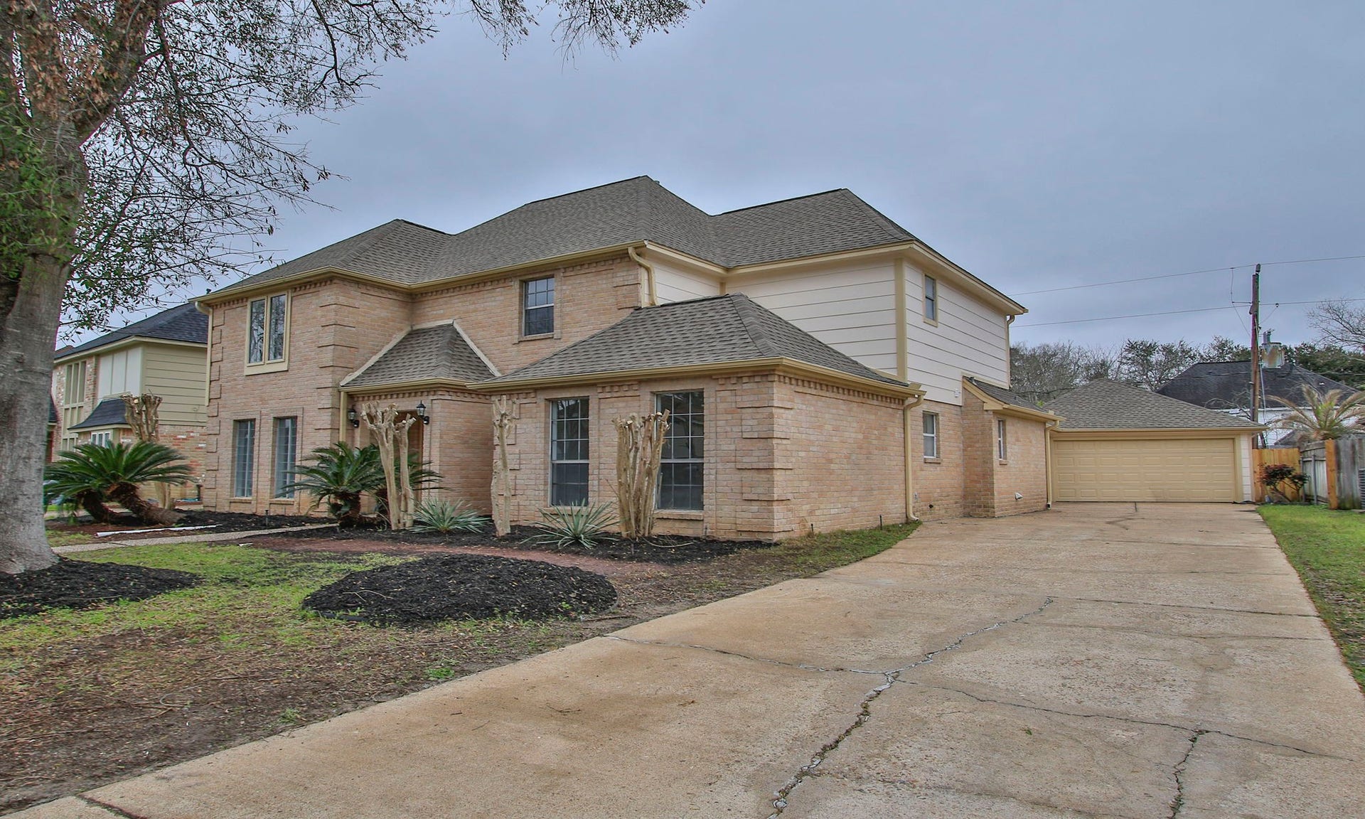 3515 Stoney Oak Drive, Houston, TX 77068 View of the home with the detached two car garage