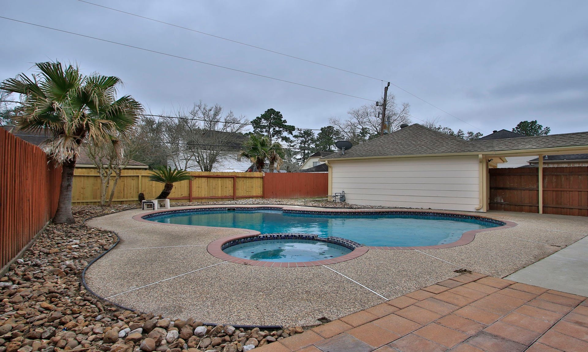3515 Stoney Oak Drive, Houston, TX 77068 The pool has an attached spa