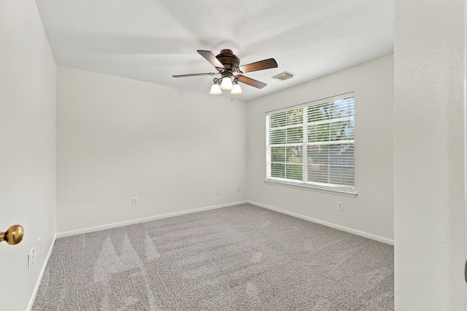 202 W Greywing Circle, The Woodlands, TX 77382 Third bedroom upstairs - fresh carpet and paint (2026)