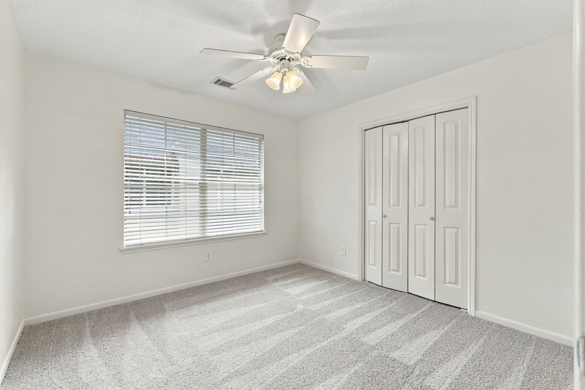 202 W Greywing Circle, The Woodlands, TX 77382 Secondary bedroom upstairs - fresh paint and carpet (2026)