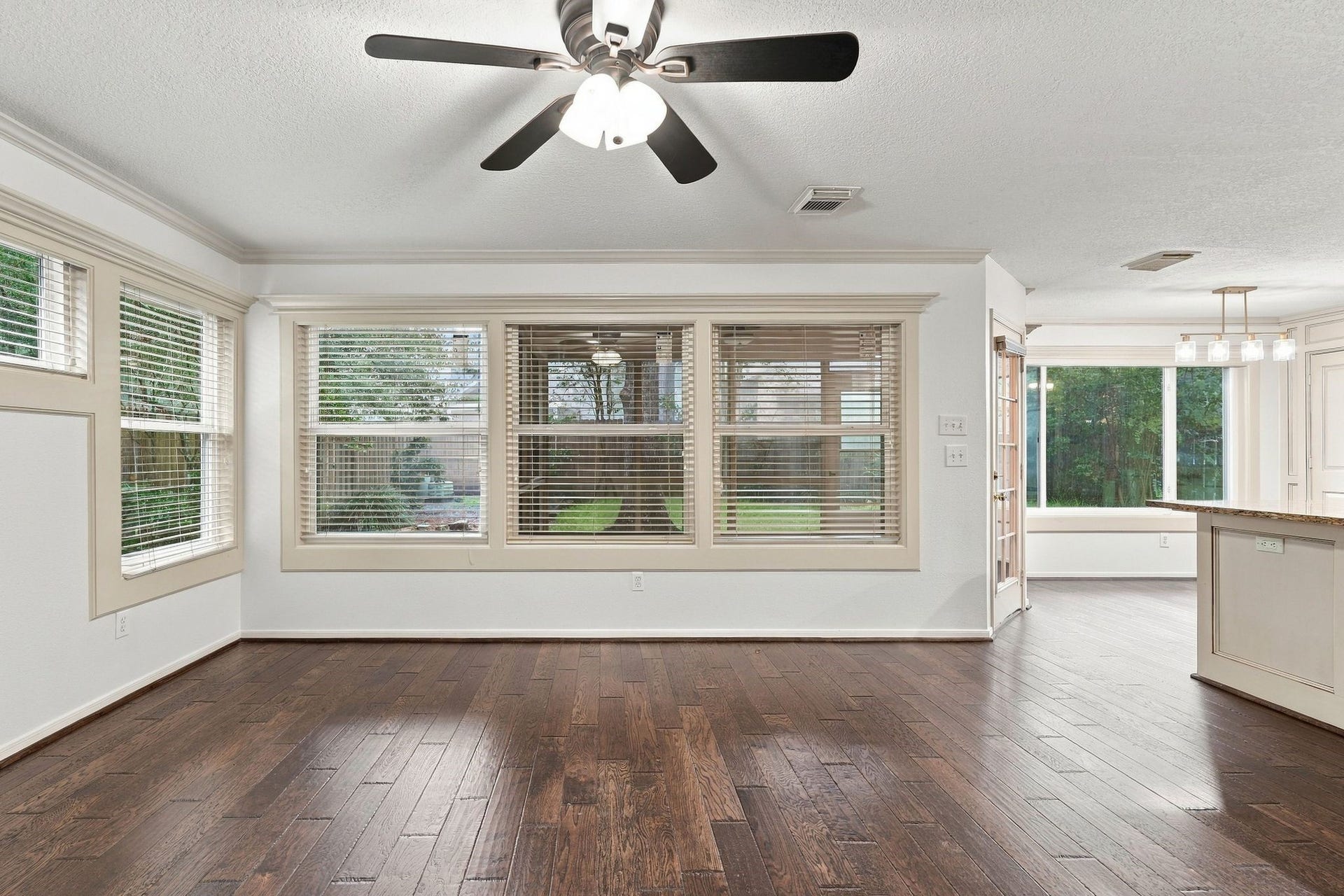 202 W Greywing Circle, The Woodlands, TX 77382 Fresh paint, hardwood floors and windows providing natural light are a backdrop for your move-in decor!