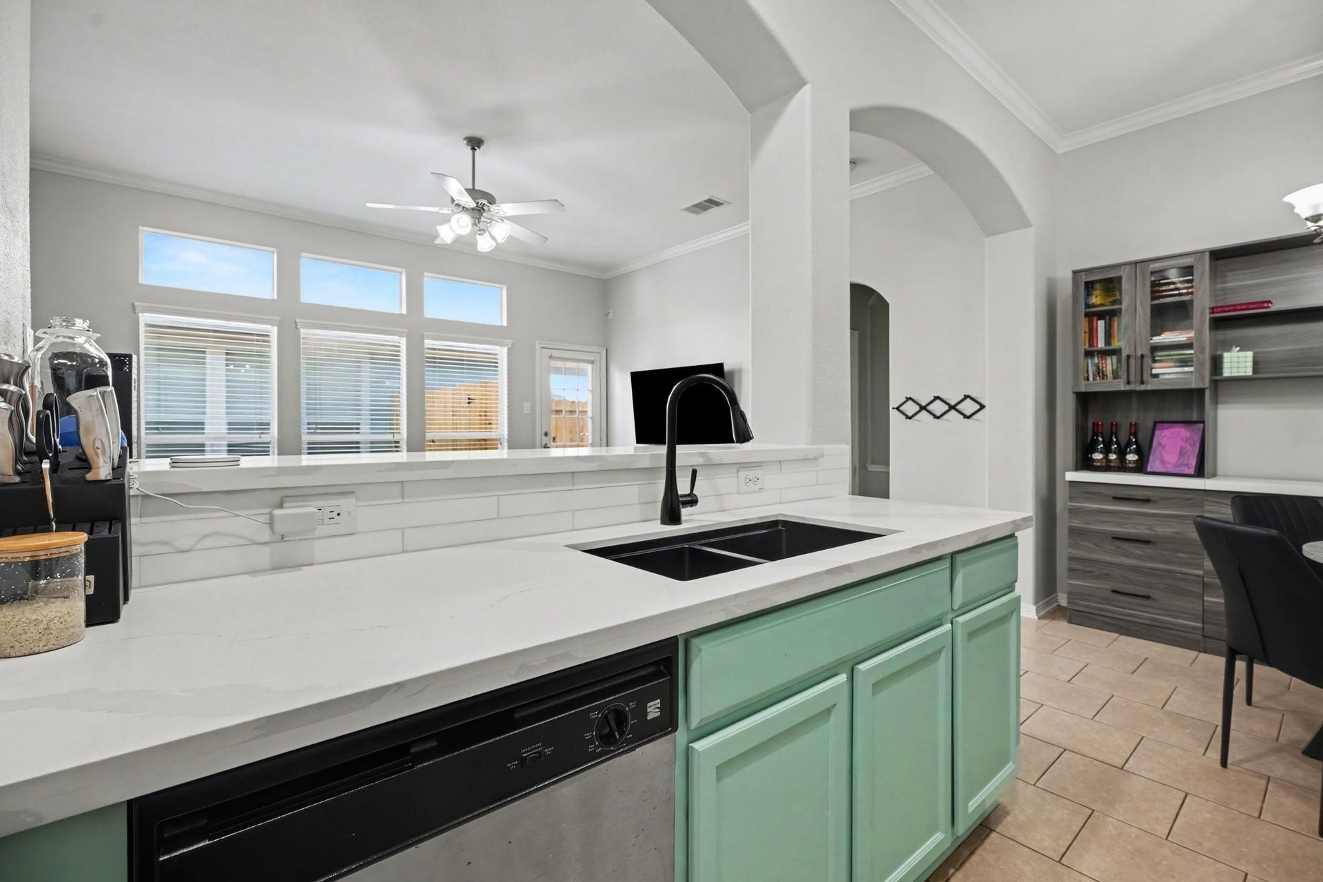2804 Sand Dune Drive, Seabrook, TX 77586 Recently remodeled featuring stainless steel appliances, a gas range, and an open layout overlooking the living room.