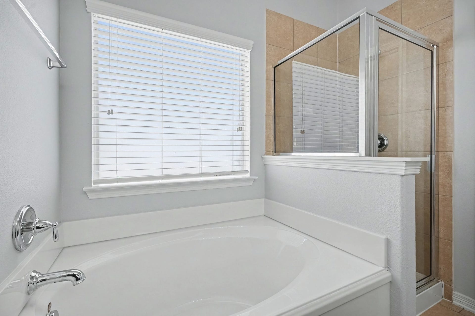 2804 Sand Dune Drive, Seabrook, TX 77586 Primary bathroom stand alone shower & soaking tub.