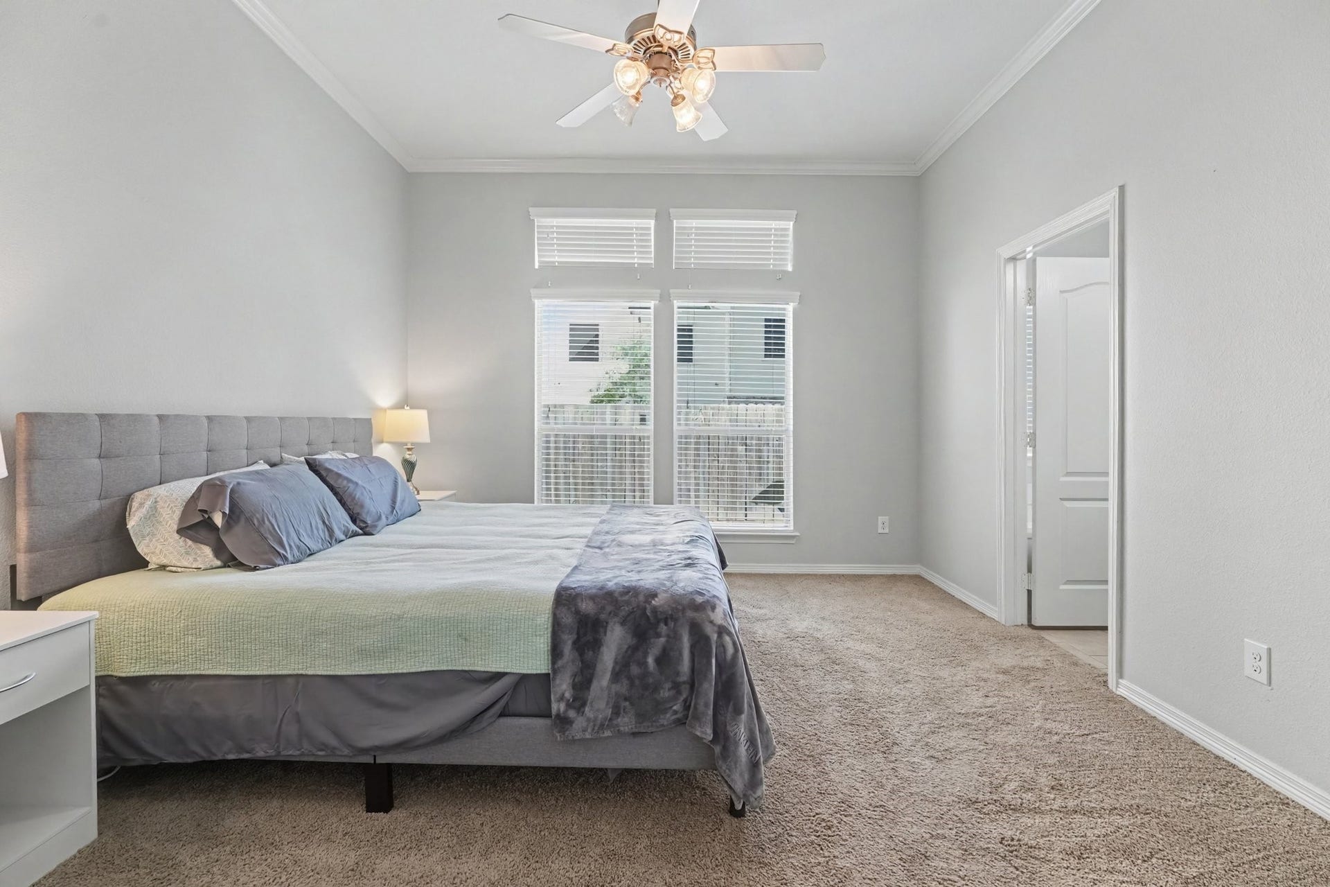 2804 Sand Dune Drive, Seabrook, TX 77586 Spacious first floor primary bedroom featuring an en-suite bathroom and walk in closet.