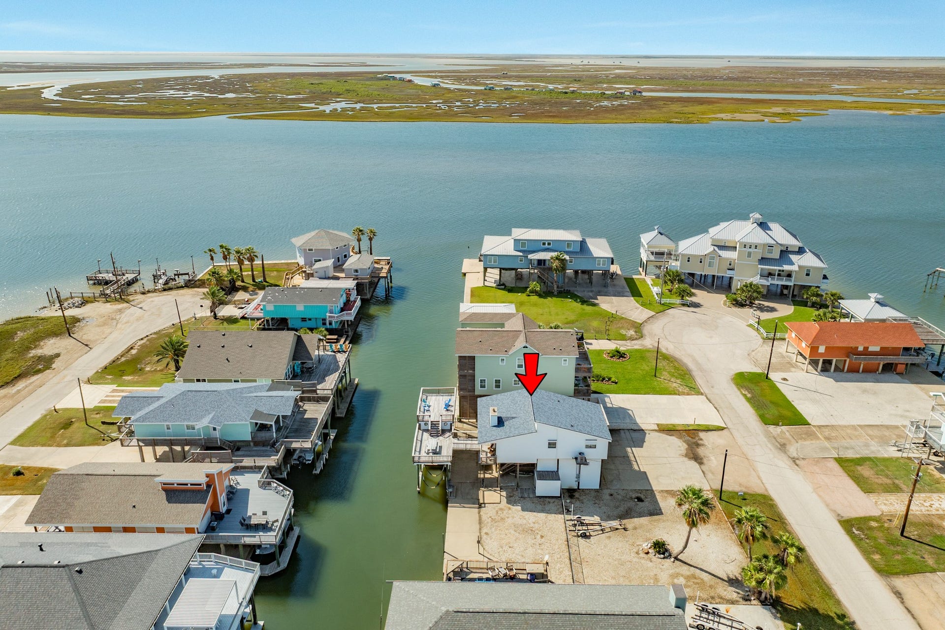 Enjoy the beauty of coastal living with nearby open water, surrounding canals, and expansive marshland views that define this waterfront community.