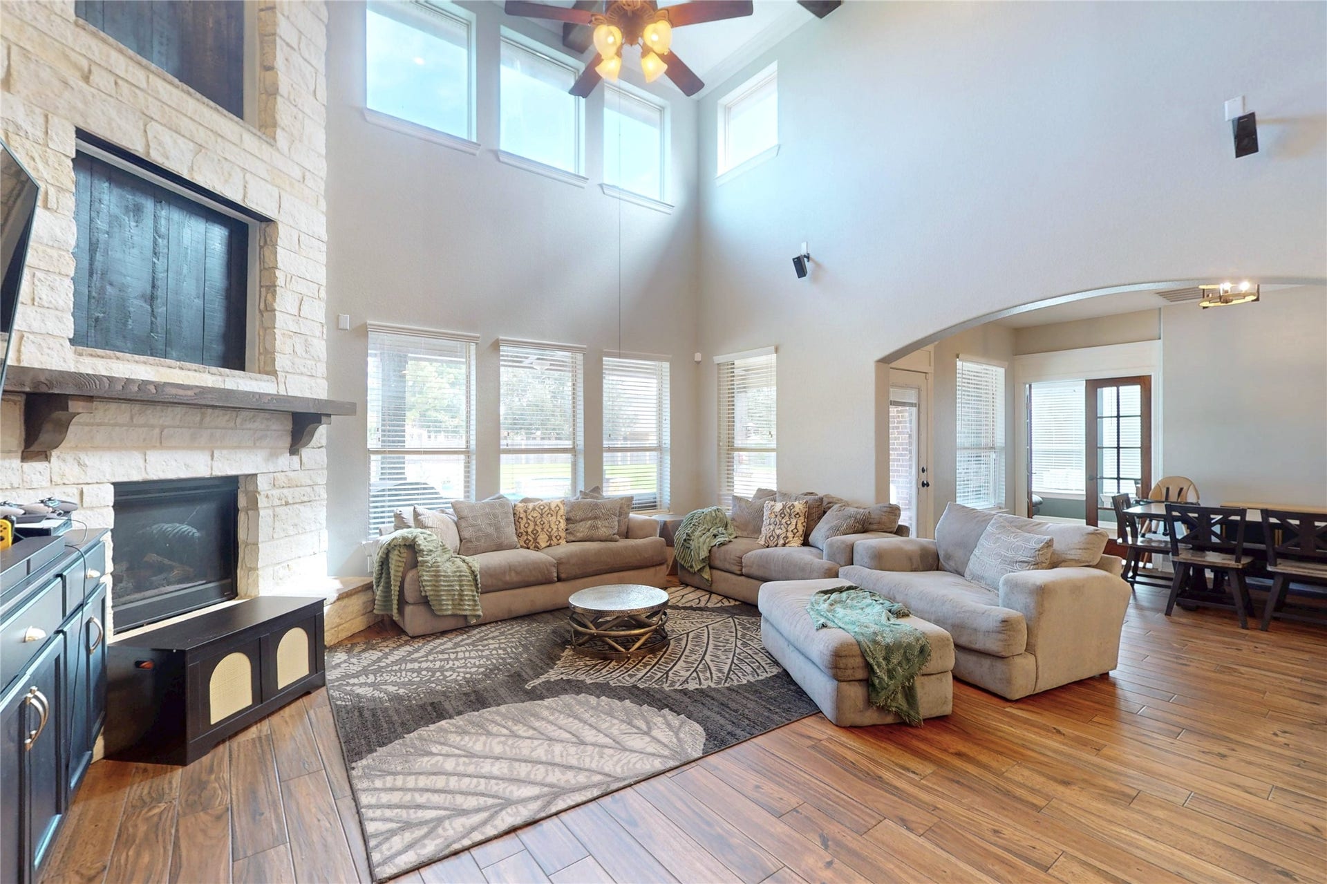 436 Old Orchard Court, Dickinson, TX 77539 Two-story living room with floor-to-ceiling stone fireplace
