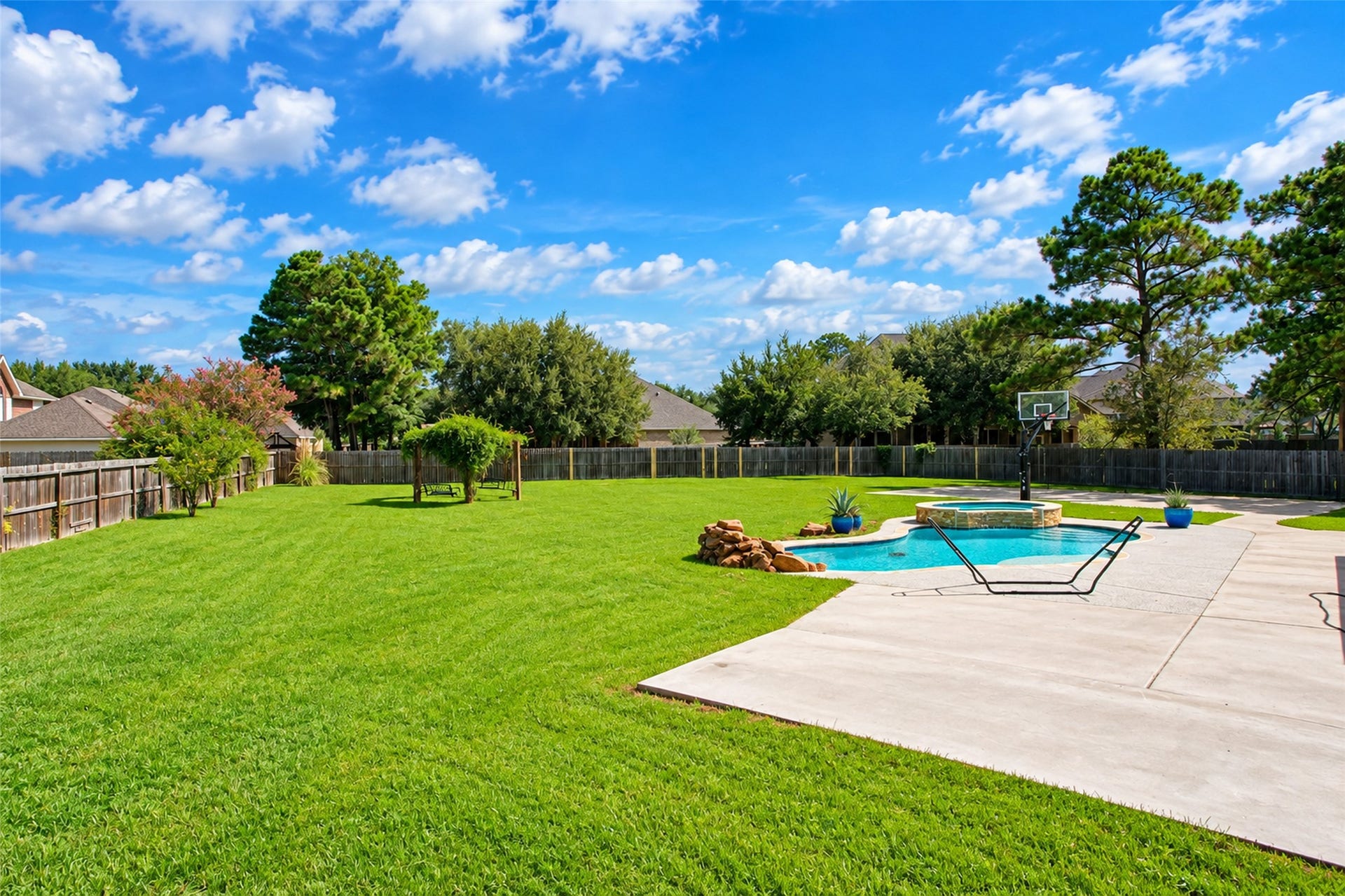 436 Old Orchard Court, Dickinson, TX 77539 Back yard - pool, spa and privacy-fenced lawn